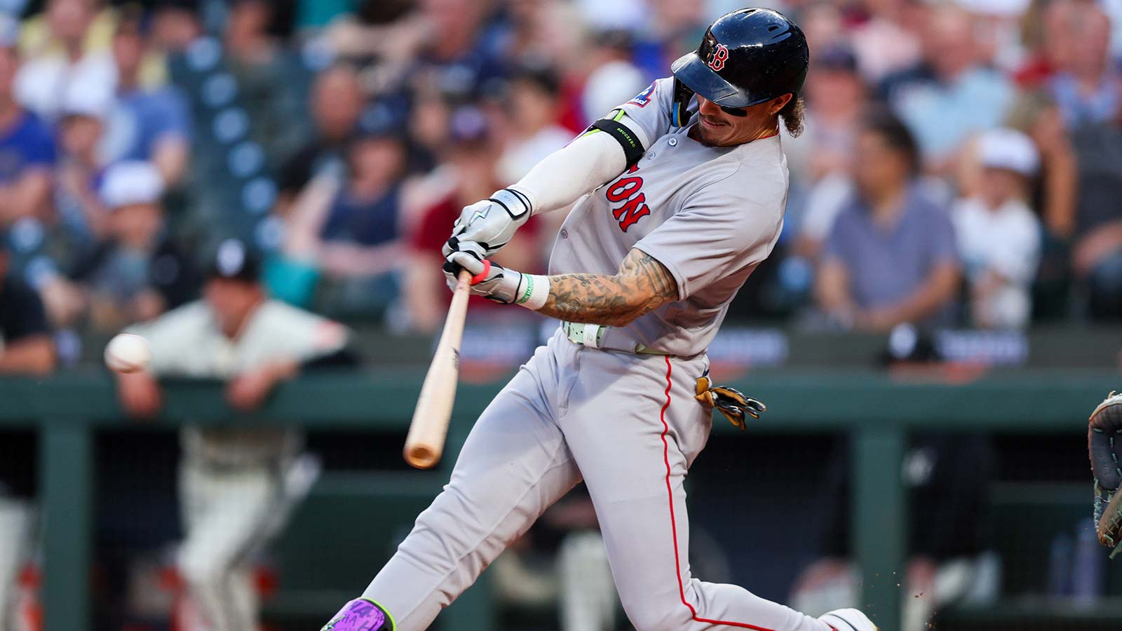 Boston Red Sox outfielder Jarren Duran (16) hits a single in the sixth inning against the Seattle Mariners at T-Mobile Park. 