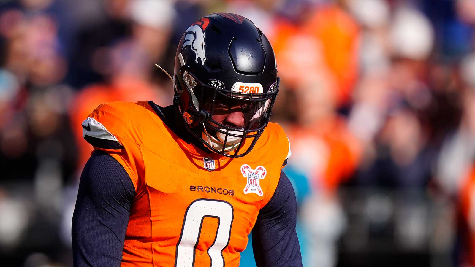 Denver Broncos linebacker Jonathon Cooper (0) before the game at Empower Field at Mile High. 