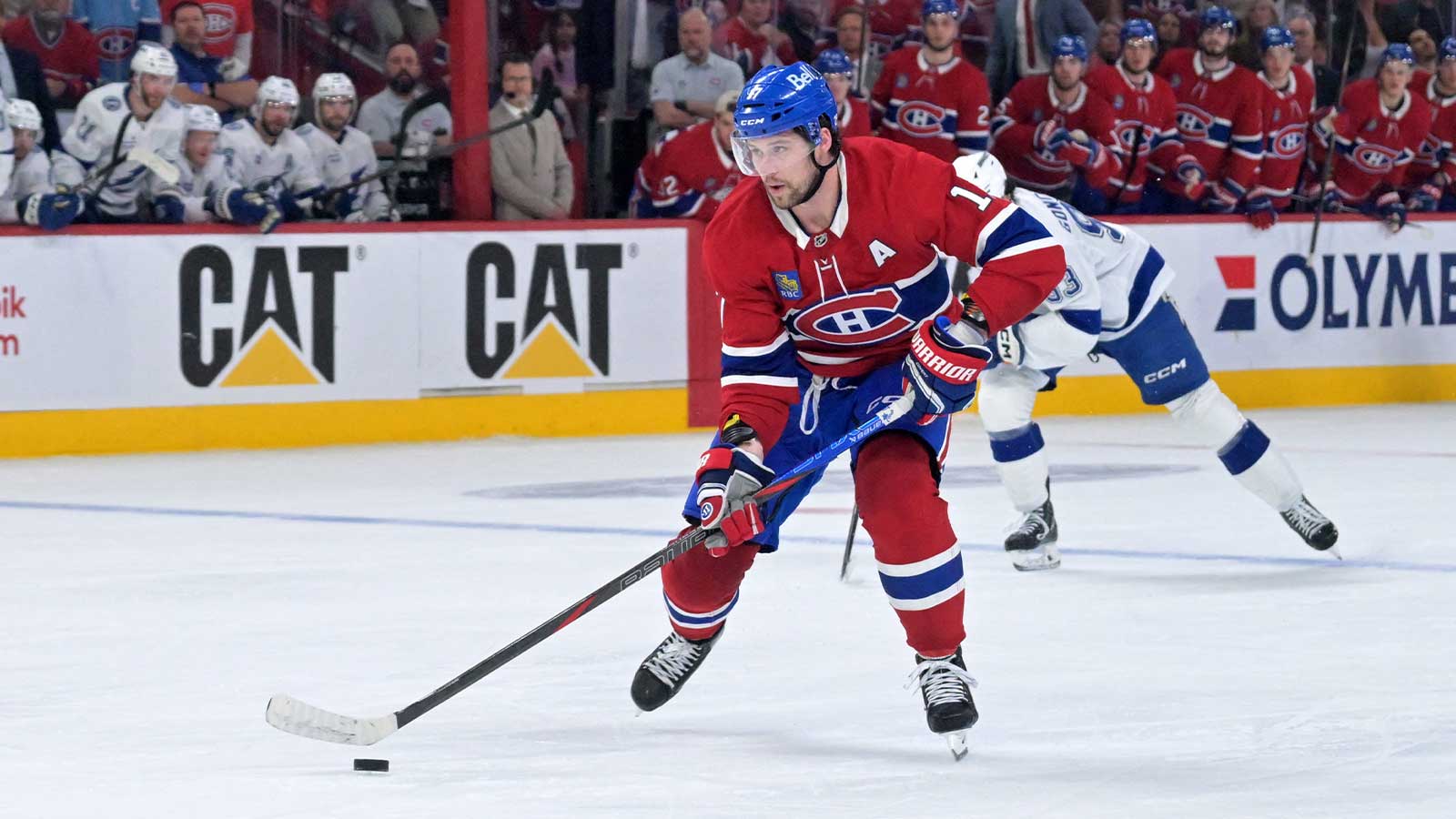 Montreal Canadiens forward Josh Anderson (17) plays the puck against the Tampa Bay Lightning during the third period in game three of the first round of the 2026 Stanley Cup Playoffs at the Bell Centre.