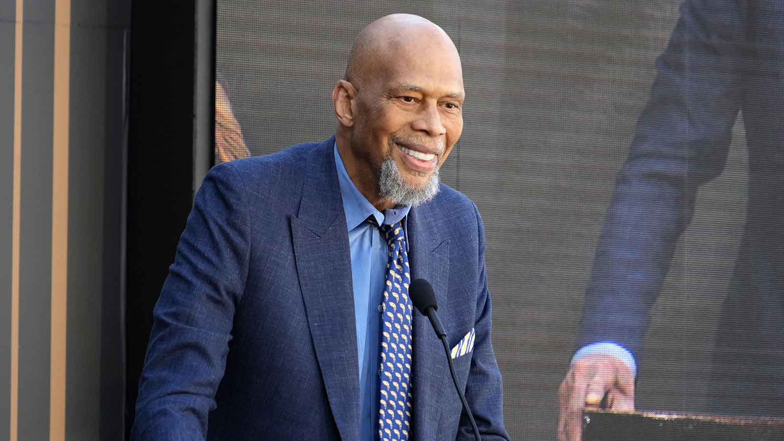 Kareem Abdul-Jabbar speaks at unveiling of statue of former Los Angeles Lakers coach Pat Riley at the Crypto.com Arena. 