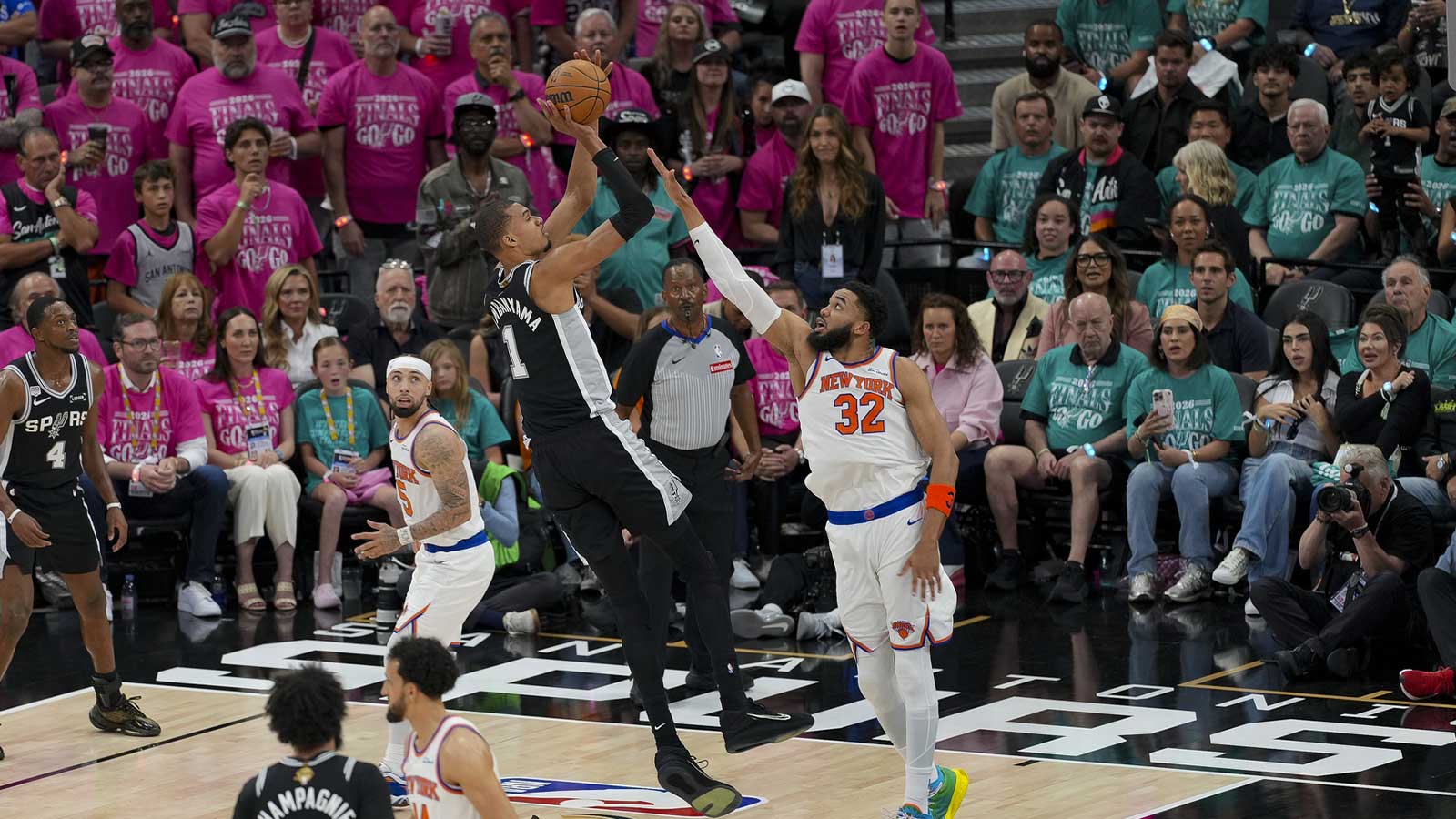 https://wp.clutchpoints.com/wp-content/uploads/2026/06/Karl-Anthony-Towns-contests-Victor-Wembanyama.jpg