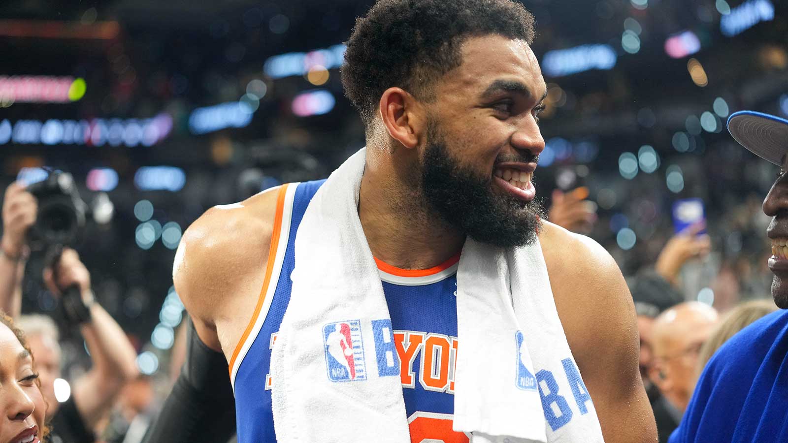 New York Knicks center Karl-Anthony Towns (32) walks off the court after the Knicks defeat the San Antonio Spurs in game two of the 2026 NBA Finals at Frost Bank Center.