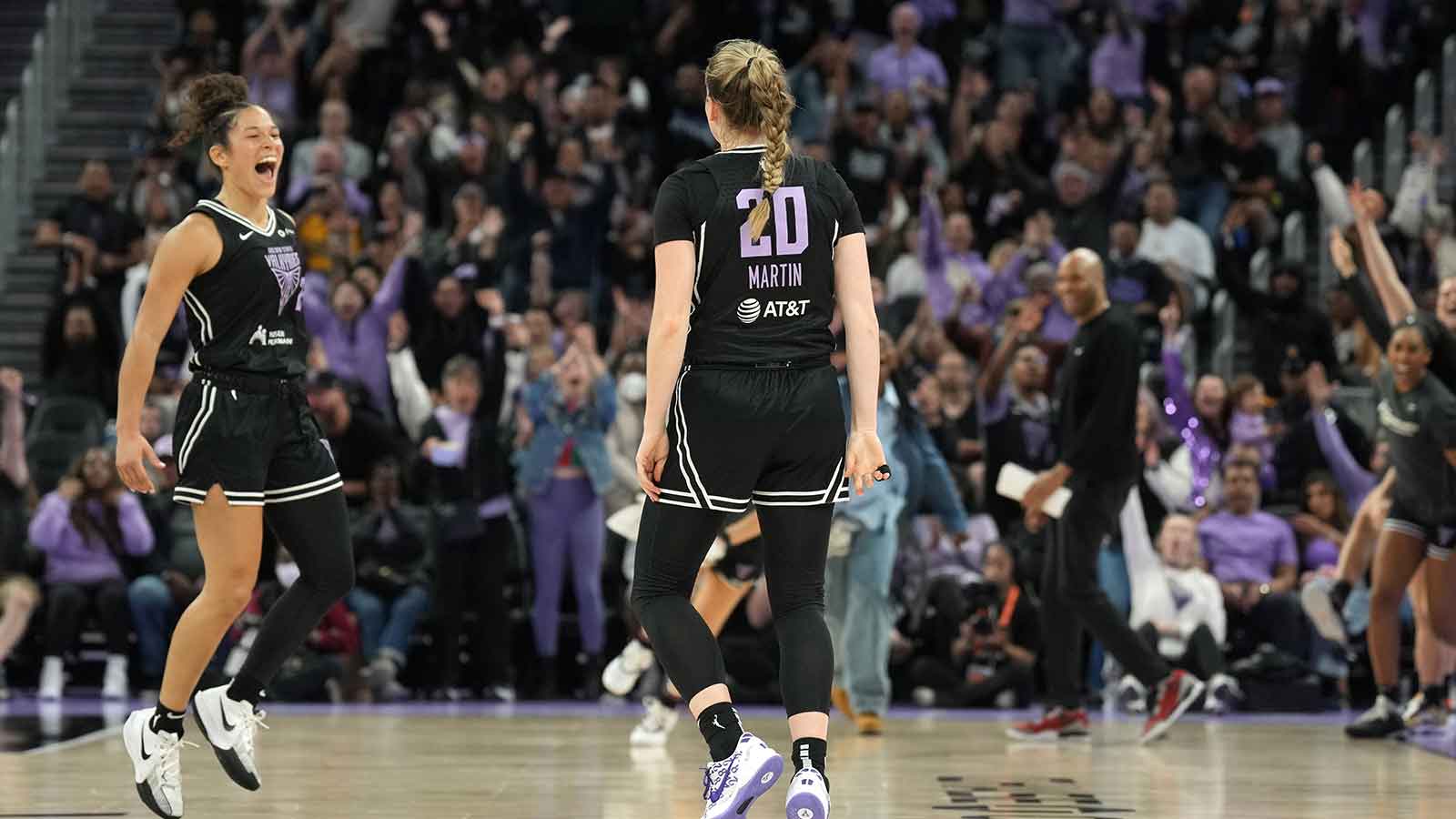 Golden State Valkyries guard Kate Martin (20) reacts with guard Veronica Burton (left) after making a three point basket against the Las Vegas Aces to end the second quarter at Chase Center. Mandatory Credit: 