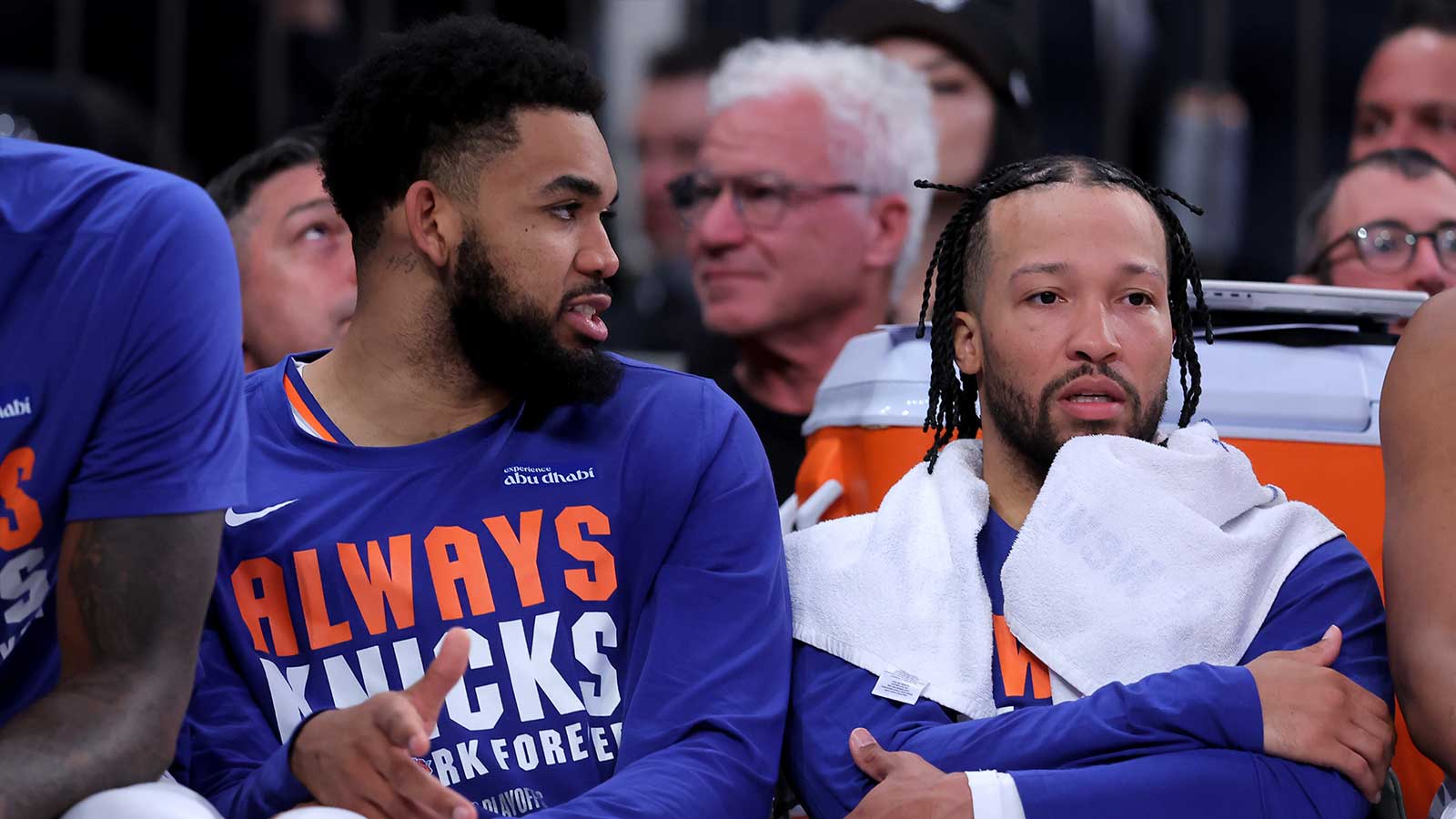 Knicks center Karl-Anthony Towns (32) talks to guard Jalen Brunson (11) as they sit on the bench during the fourth quarter of game one of the eastern conference semifinal round of the 2026 NBA Playoffs against the Philadelphia 76ers at Madison Square Garden