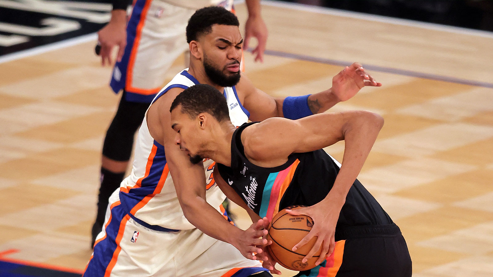 https://wp.clutchpoints.com/wp-content/uploads/2026/06/Knicks-center-Karl-Anthony-Towns-32-defends-against-Spurs-forward-Victor-Wembanyama.jpg