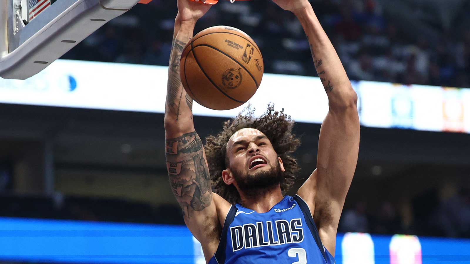 https://wp.clutchpoints.com/wp-content/uploads/2026/06/Mavericks-center-Dereck-Lively-II-slams-it-home.jpg