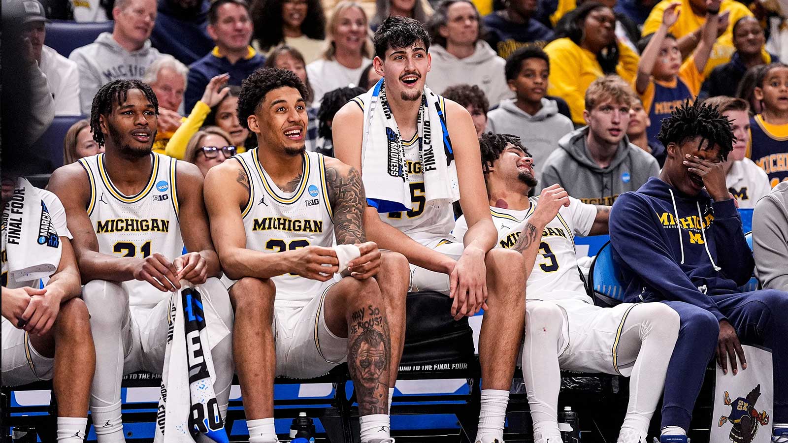 From left, Michigan forward Morez Johnson Jr., forward Yaxel Lendeborg, center Aday Mara, guard Elliot Cadeau and guard L.J. Cason watch the final seconds of the game against Howard from the bench at the NCAA tournament in the first round at KeyBank Center in Buffalo on Thursday, March 19, 2026.