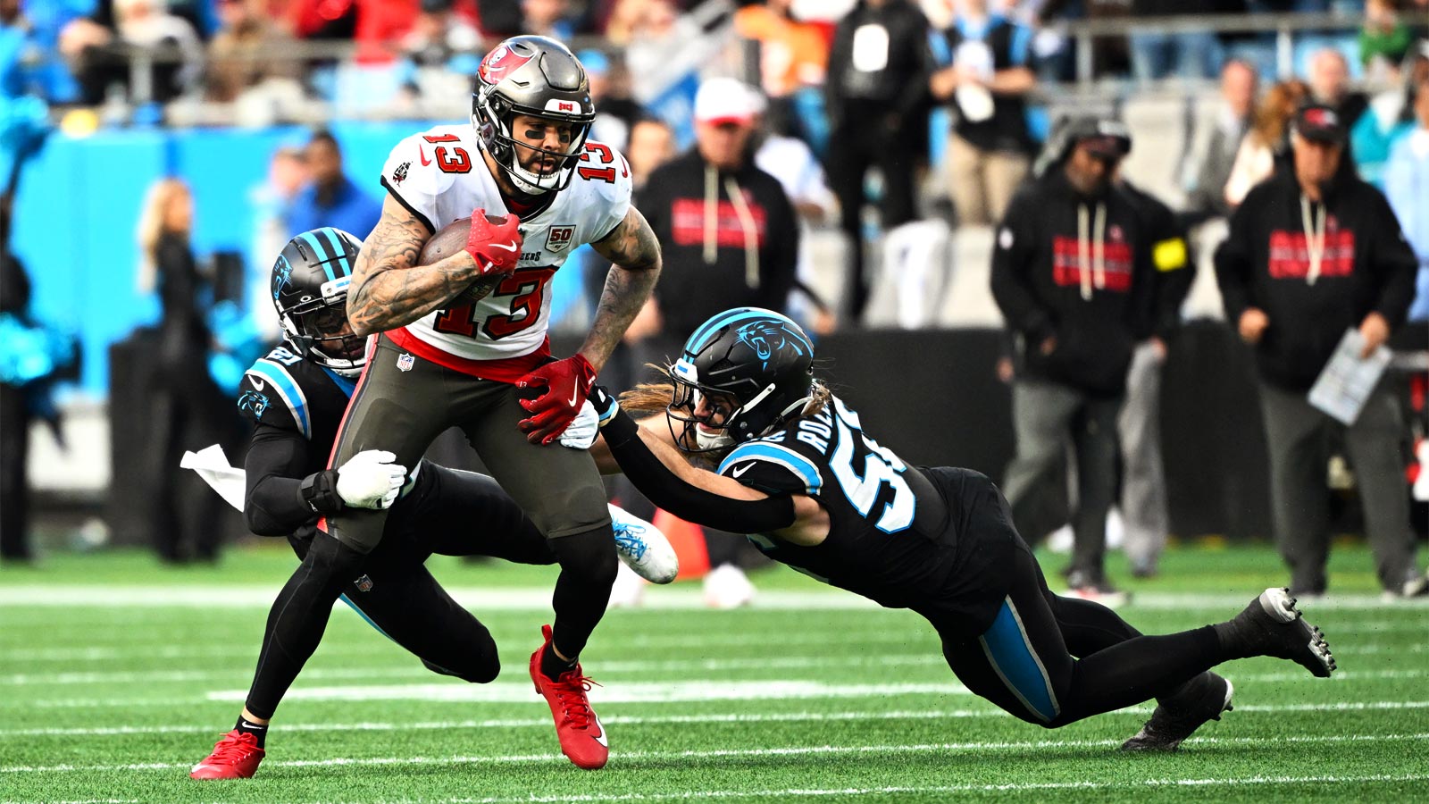 Tampa Bay Buccaneers wide receiver Mike Evans (13) runs against Carolina Panthers linebacker Christian Rozeboom (56) during the second half at Bank of America Stadium. 
