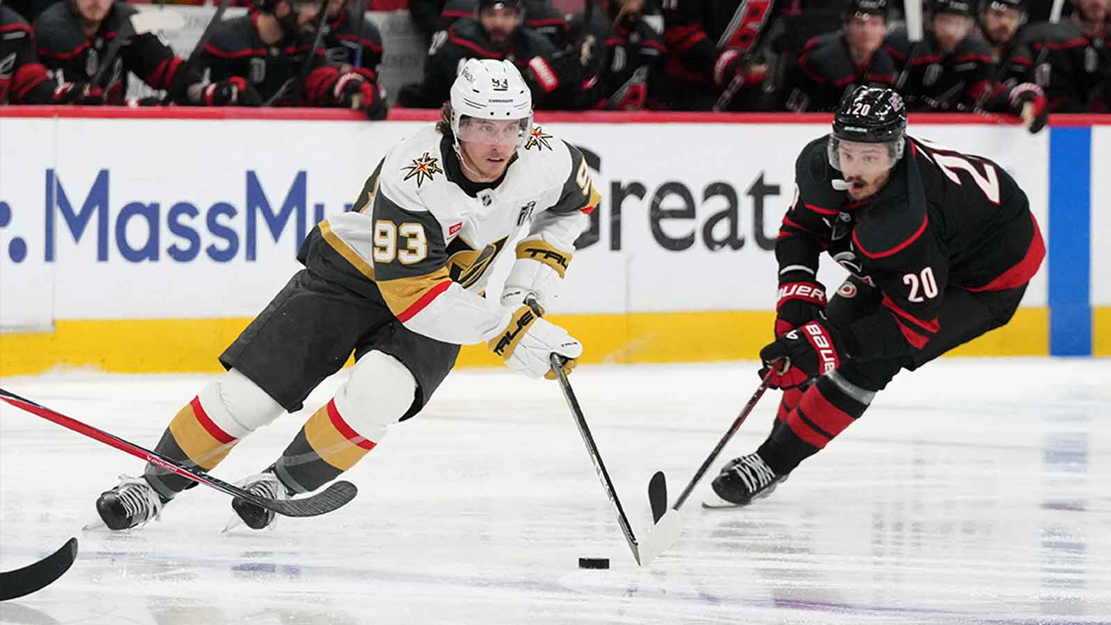 Vegas Golden Knights right wing Mitch Marner (93) carries the puck against Carolina Hurricanes center Sebastian Aho (20) during the second period in game five of the 2026 Stanley Cup Final at Lenovo Center.