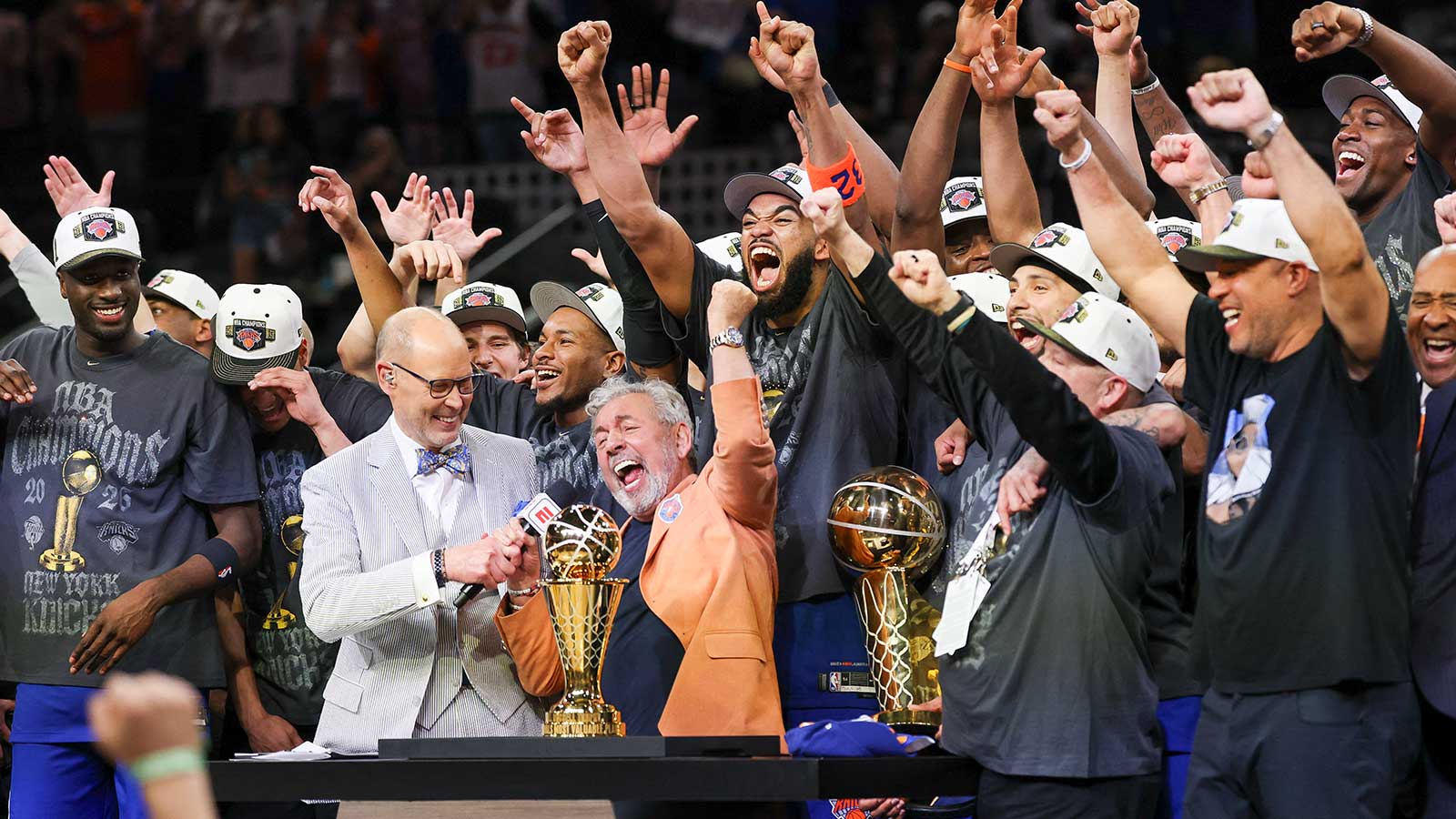 New York Knicks owner James Dolan and the players celebrate after defeating the San Antonio Spurs during game five of the 2026 NBA Finals at Frost Bank Center.