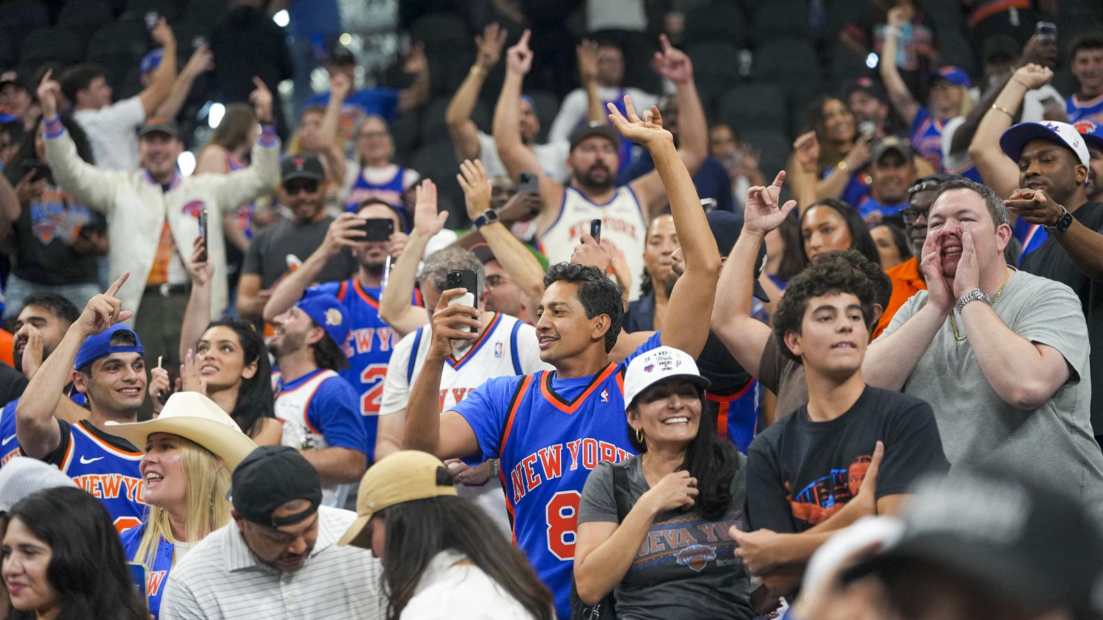 The New York Knicks fans celebrate after the Knicks defeat the San Antonio Spurs in game two of the 2026 NBA Finals at Frost Bank Center.