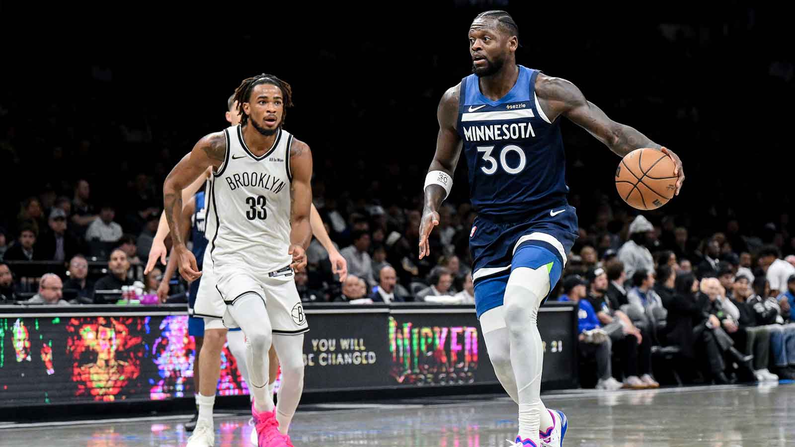 Minnesota Timberwolves forward Julius Randle (30) looks to drive against Brooklyn Nets center Nic Claxton (33) during the first half at Barclays Center.