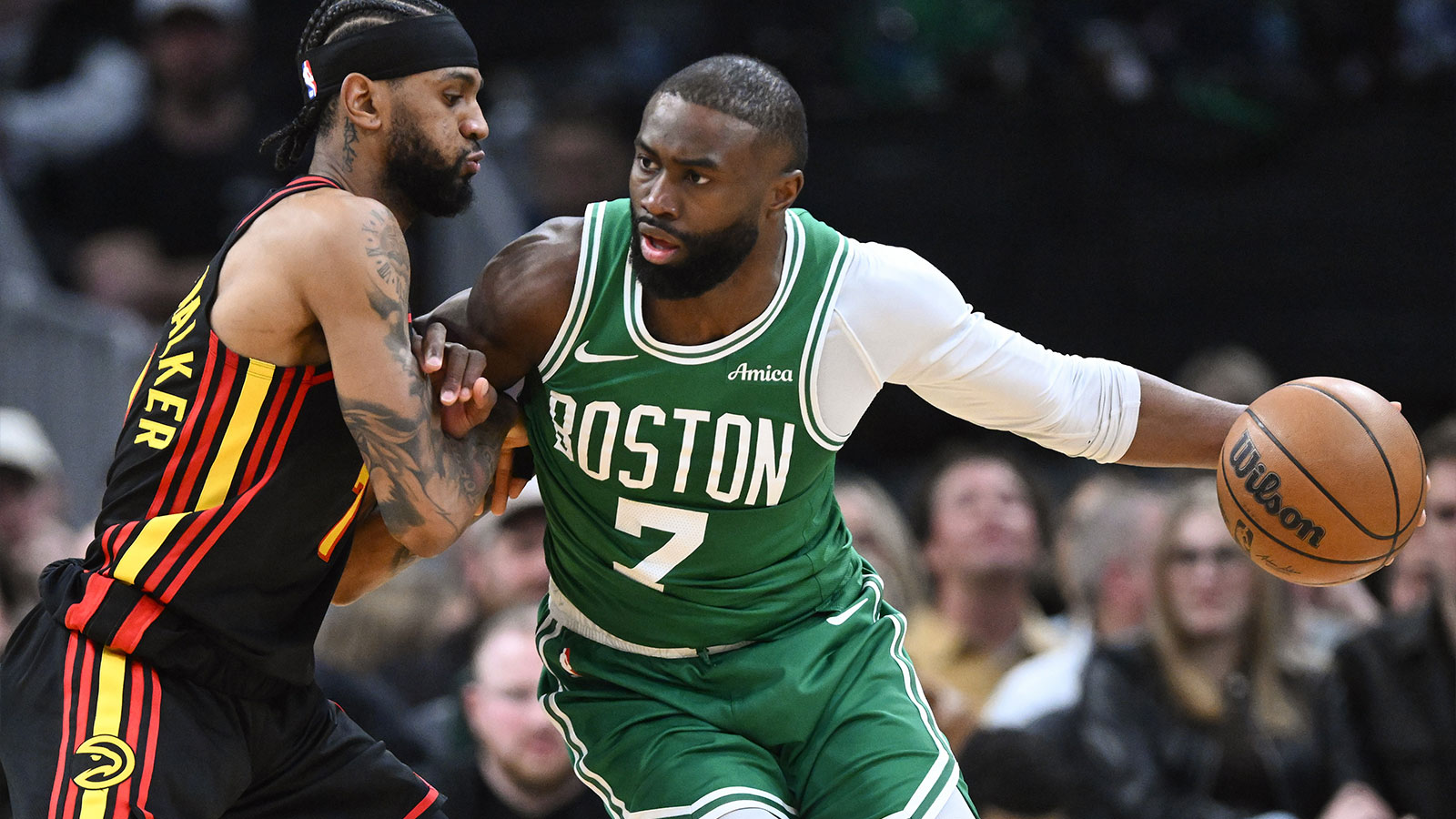 Boston Celtics guard Jaylen Brown (7) drives to the basket against Atlanta Hawks guard Nickeil Alexander-Walker (7) during the first half at the TD Garden.