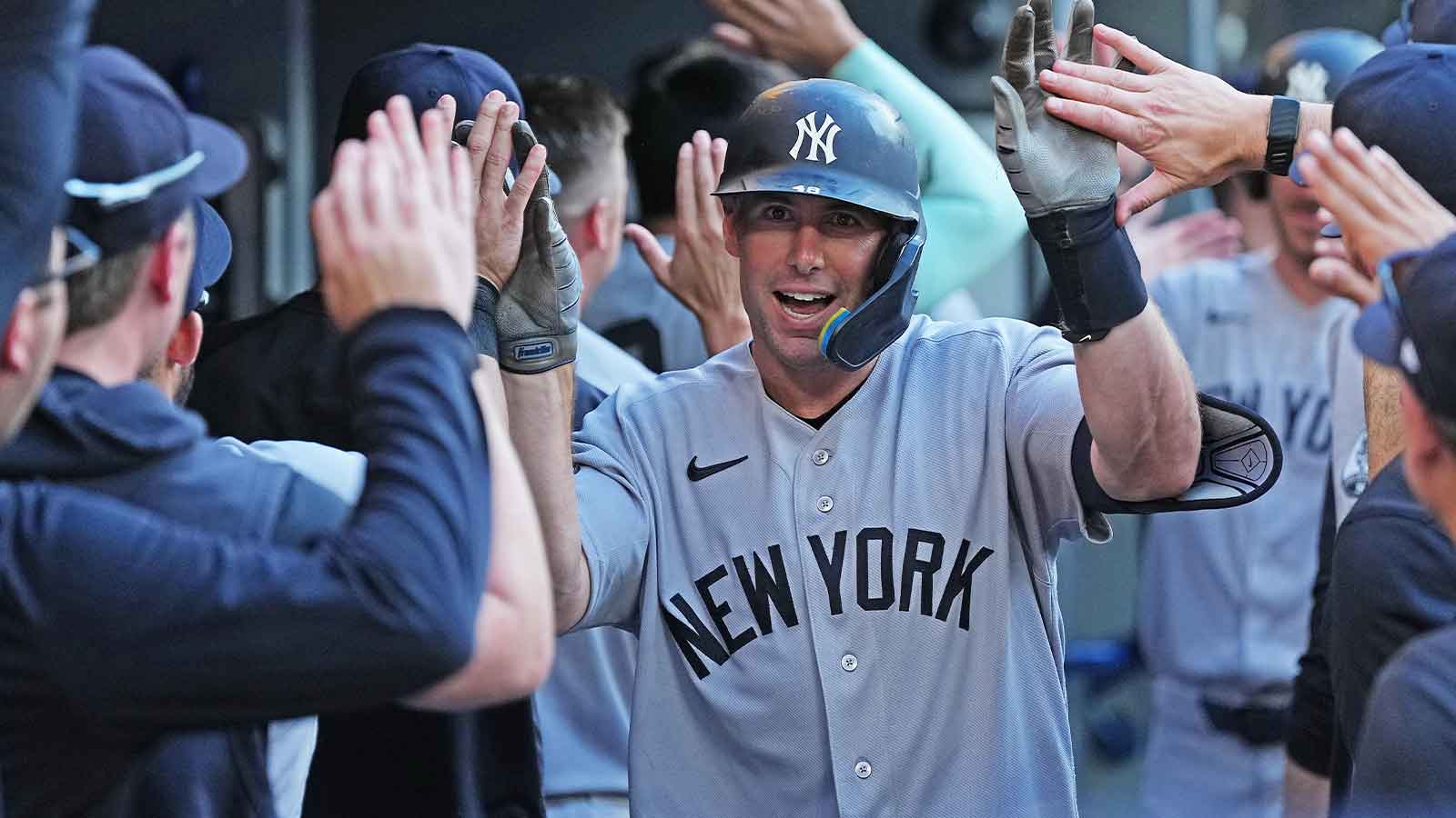 New York Yankees designated hitter Paul Goldschmidt (48) celebrates in the dugout after hitting a two run home run against the Toronto Blue Jays during the ninth inning at Rogers Centre. Mandatory Credit: Nick Turchiaro-Imagn Images