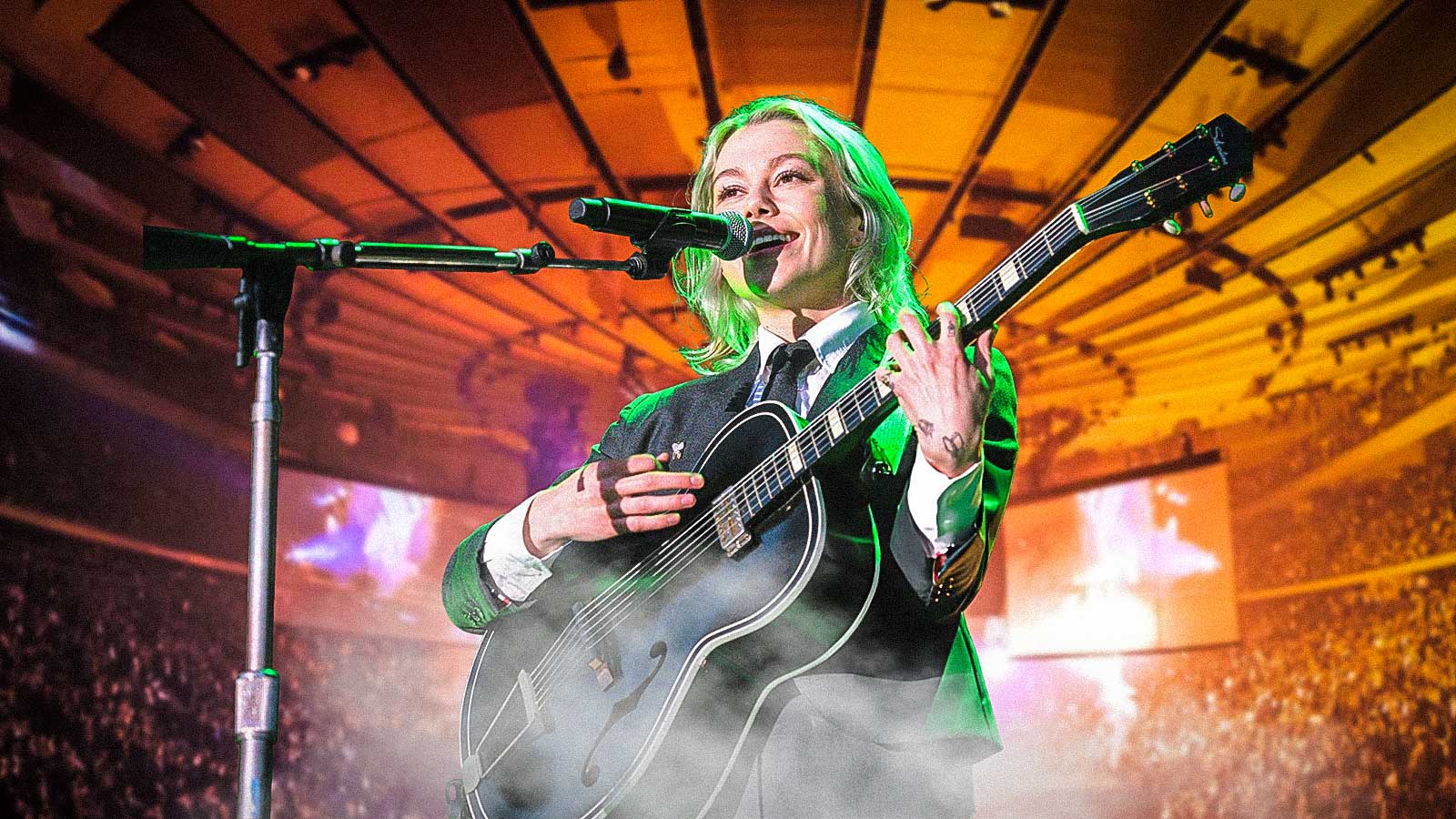 Phoebe Bridgers performing with Madison Square Garden (MSG) in background.