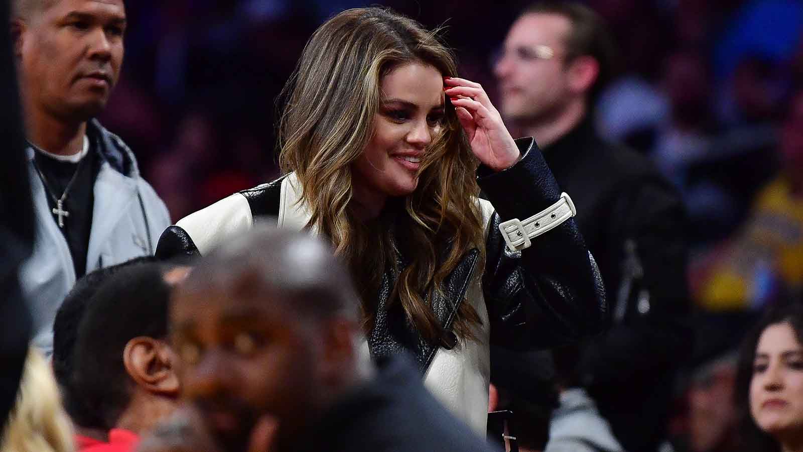 Longtime San Antonio Spurs fan Selena Gomez at NBA game.