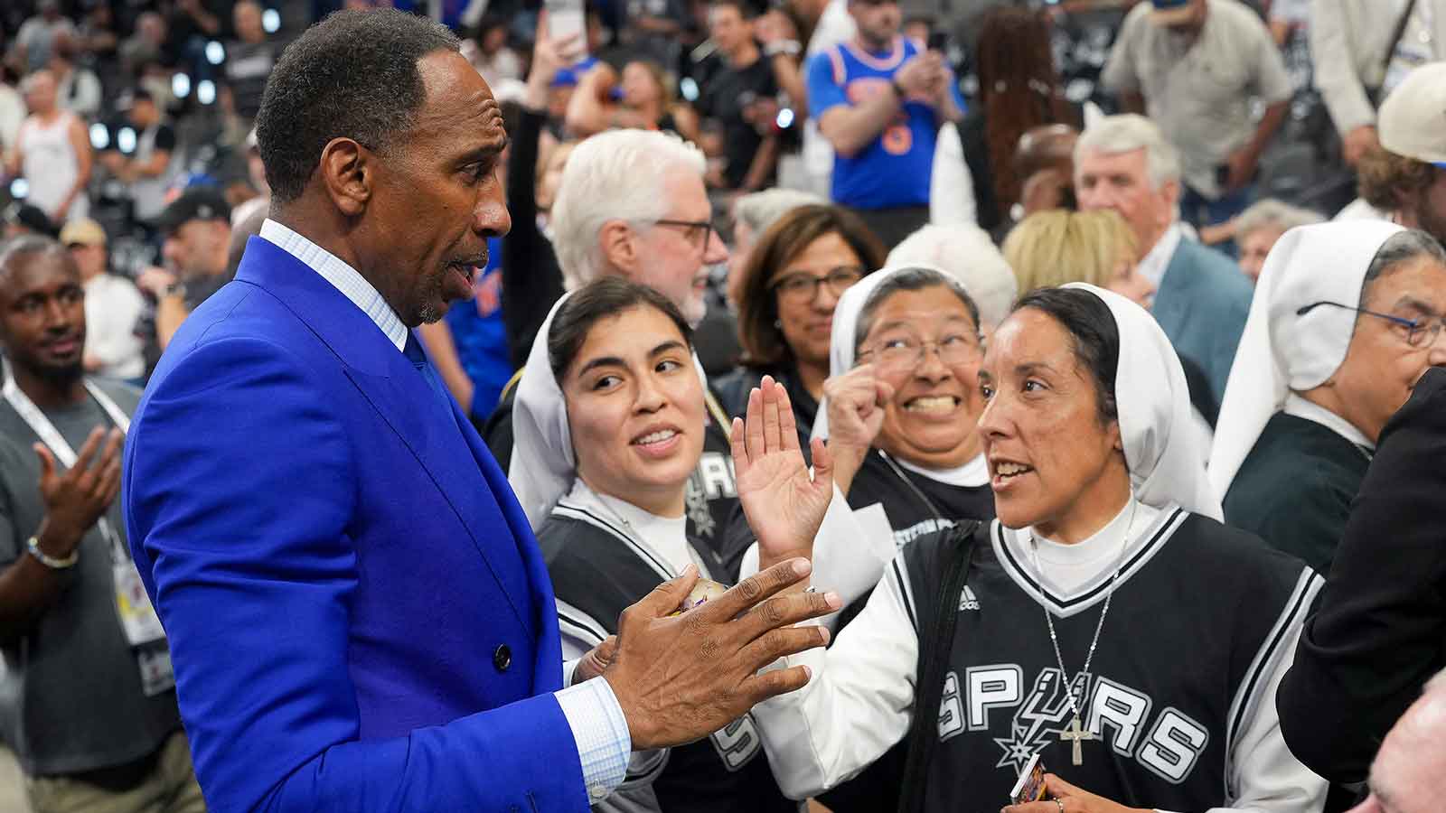 https://wp.clutchpoints.com/wp-content/uploads/2026/06/Stephen-A.-Smith-talks-with-the-Spurs-Nuns-before-Spurs-Knicks.jpg