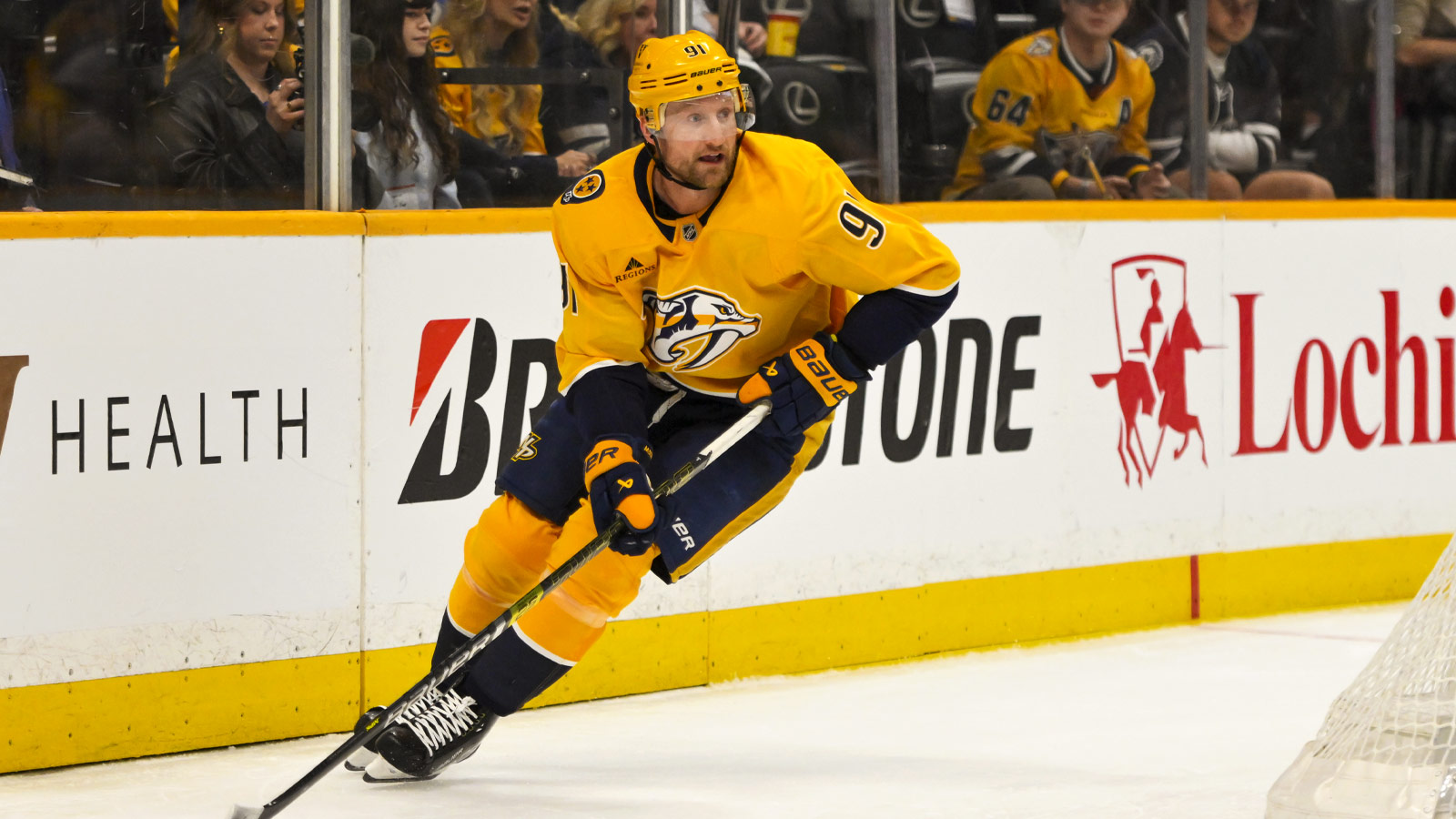 Nashville Predators center Steven Stamkos (91) skates behind the net against the Vegas Golden Knights during the first period at Bridgestone Arena.