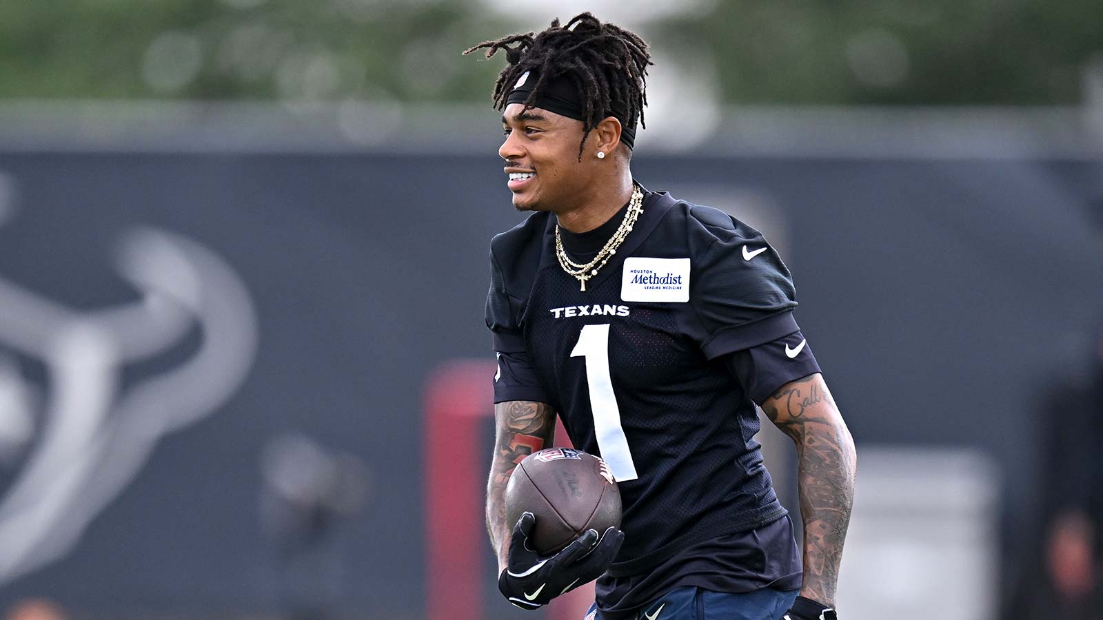Texans’ Tank Dell shares honest training camp outlook after missing 2025