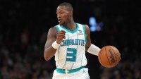 Charlotte Hornets guard Terry Rozier (3) dribbles against the Phoenix Suns during the first half at Footprint Center.