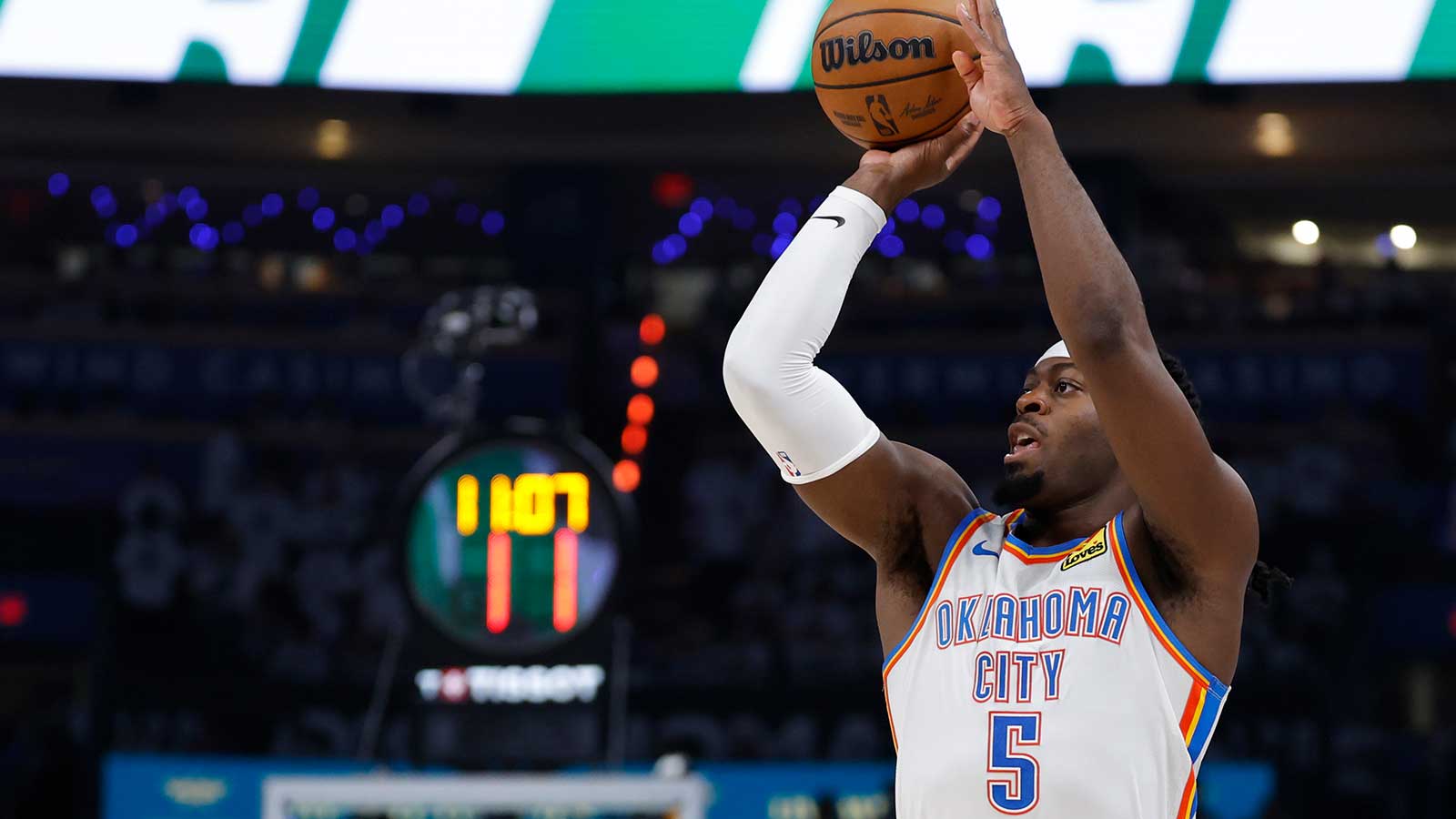 Thunder guard Lu Dort (5) shoots during the third quarter against the San Antonio Spurs in game five of the western conference finals for the 2026 NBA playoffs at Paycom Center