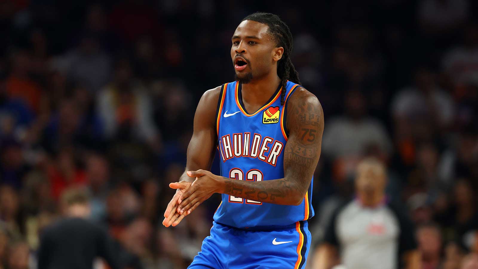 Thunder guard Cason Wallace (22) against the Phoenix Suns during game four of the first round of the 2026 NBA Playoffs at Mortgage Matchup Center with Lu Dort in the background