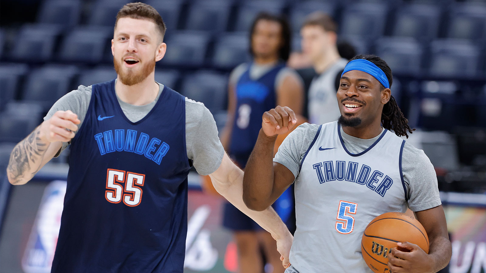 Thunder center Isaiah Hartenstein (55) and guard Luguentz Dort (5) during NBA Finals Media Day at Paycom Center