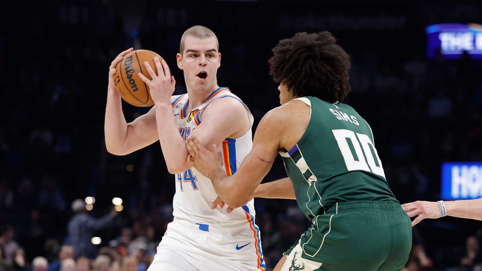 Thunder guard Nikola Topić (44) moves the ball against Milwaukee Bucks center Jericho Sims (00) during the second half at Paycom Center
