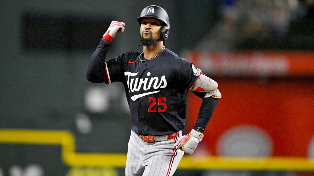 Minnesota Twins center fielder Byron Buxton (25) rounds the bases after hitting a home run against the Texas Rangers during the sixth inning at Globe Life Field.