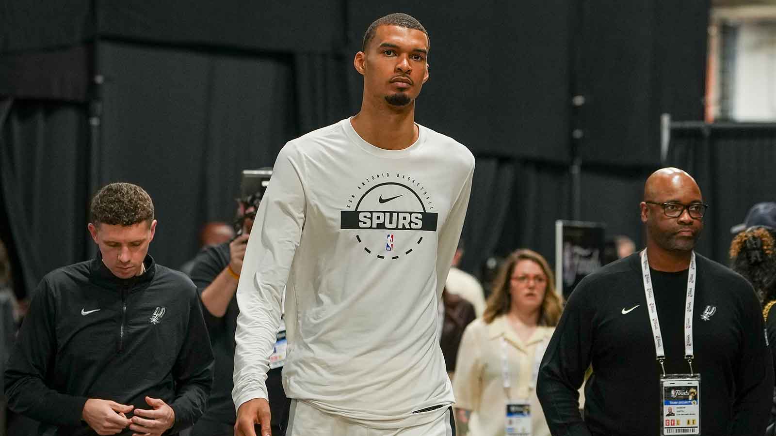 https://wp.clutchpoints.com/wp-content/uploads/2026/06/Victor-Wembanyama-walks-into-the-arena.jpg