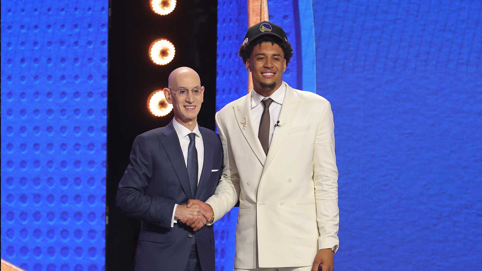 Adam Silver greets the eleventh pick in the 2026 NBA draft, Michigan forward Yaxel Lendeborg after he was selected by the Golden State Warriors at Barclays Center