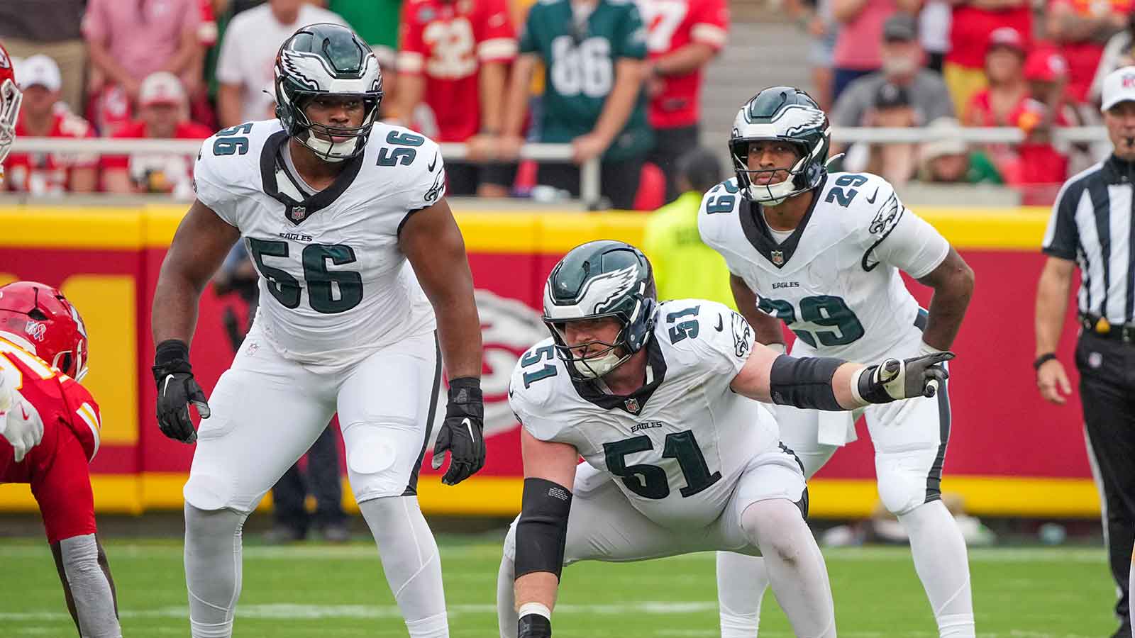 Philadelphia Eagles guard Tyler Steen (56) and center Willie Lampkin (61) on the line of scrimmage against the Kansas City Chiefs during the game at GEHA Field at Arrowhead Stadium.