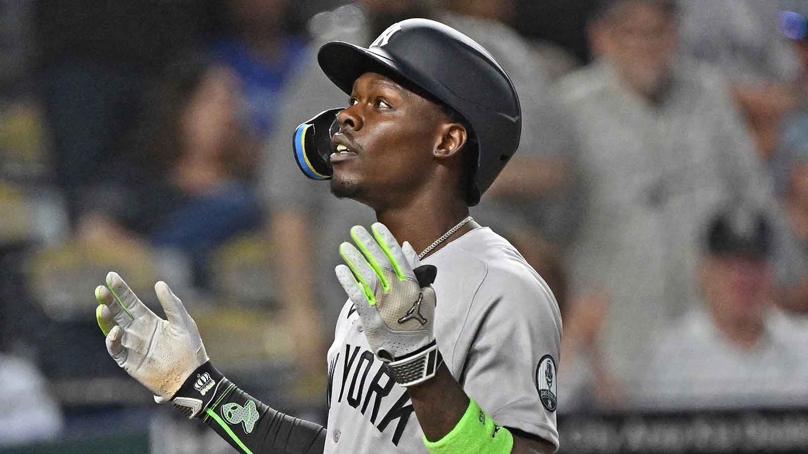  New York Yankees second baseman Jazz Chisholm Jr. (13) reacts after hitting a solo home run in the eighth inning against the Kansas City Royals at Kauffman Stadium.