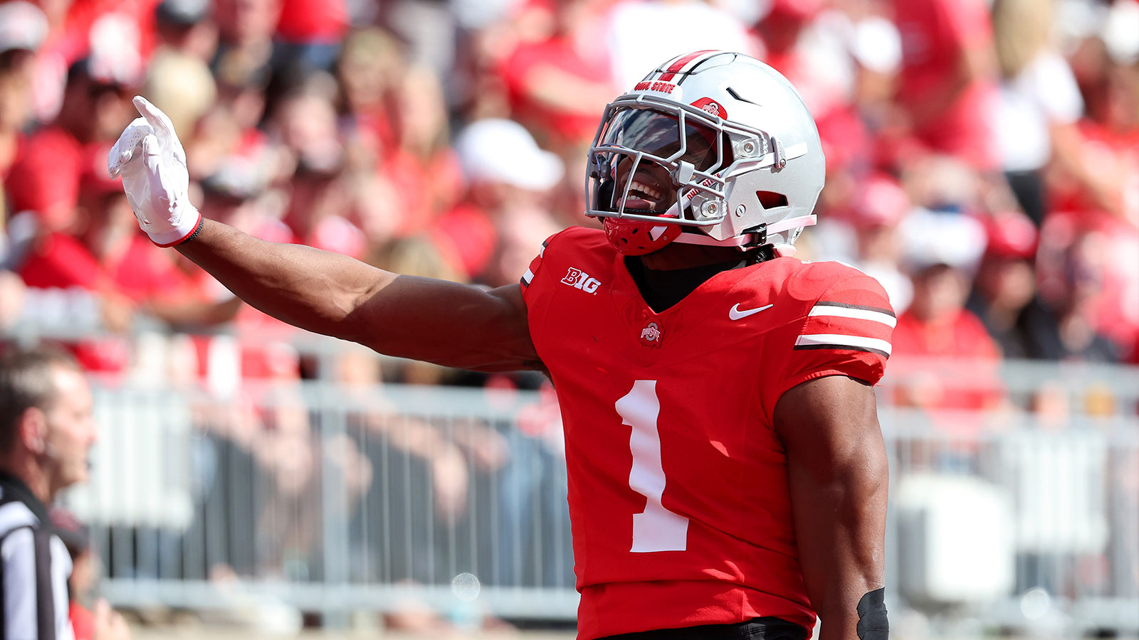 Ohio State Buckeyes cornerback Davison Igbinosun (1) celebrates his pass break up during the second quarter against the Grambling State Tigers at Ohio Stadium. 
