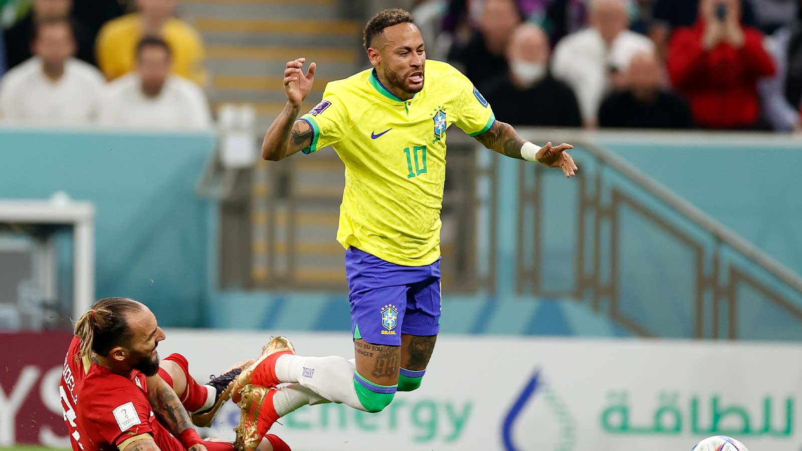 Brazil forward Neymar (10) kicks the ball against Serbia during the second half in a group stage match during the 2022 World Cup at Lusail Stadium.