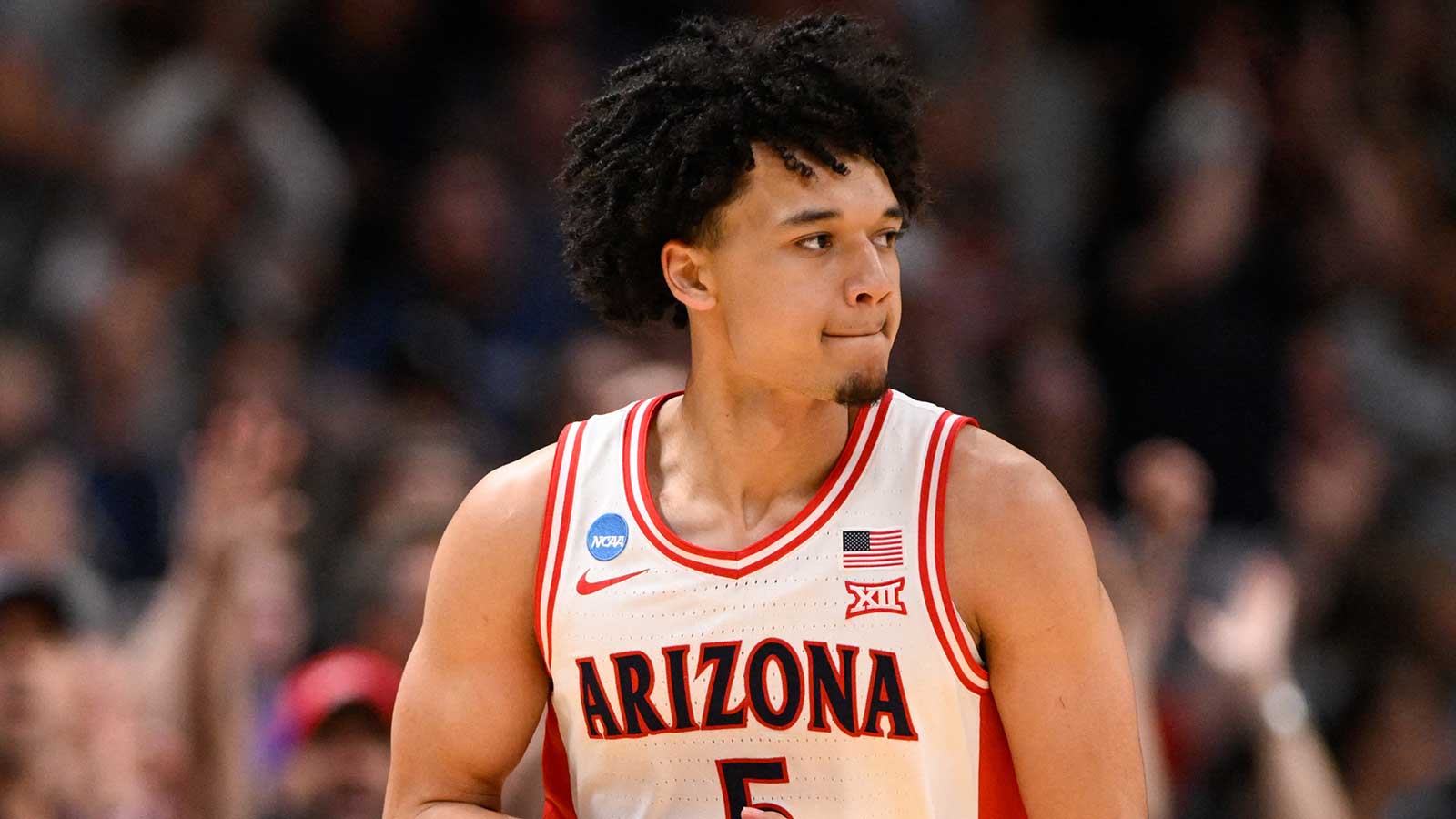 Arizona Wildcats guard Brayden Burries (5) celebrates after a three-point basket against the Purdue Boilermakers in the second half during an Elite Eight game of the West Regional of the men's 2026 NCAA Tournament at SAP Center