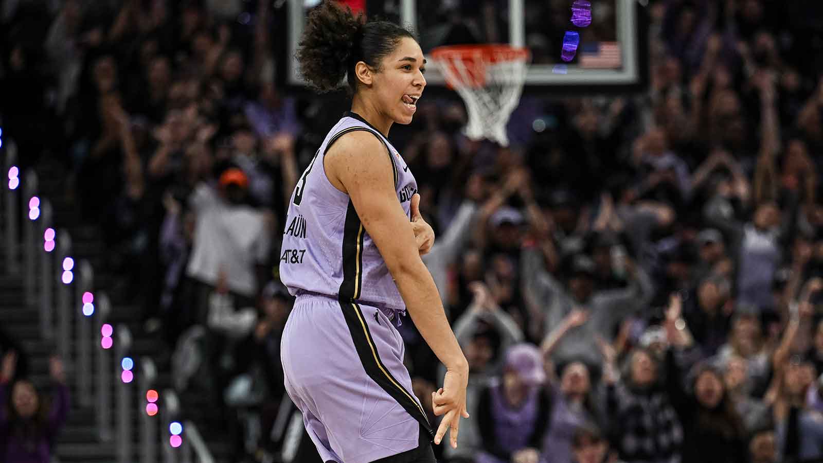 Golden State Valkyries forward Janelle Salaun (13) reacts after a three point basket against the Portland Fire during the fourth quarter at Chase Center.