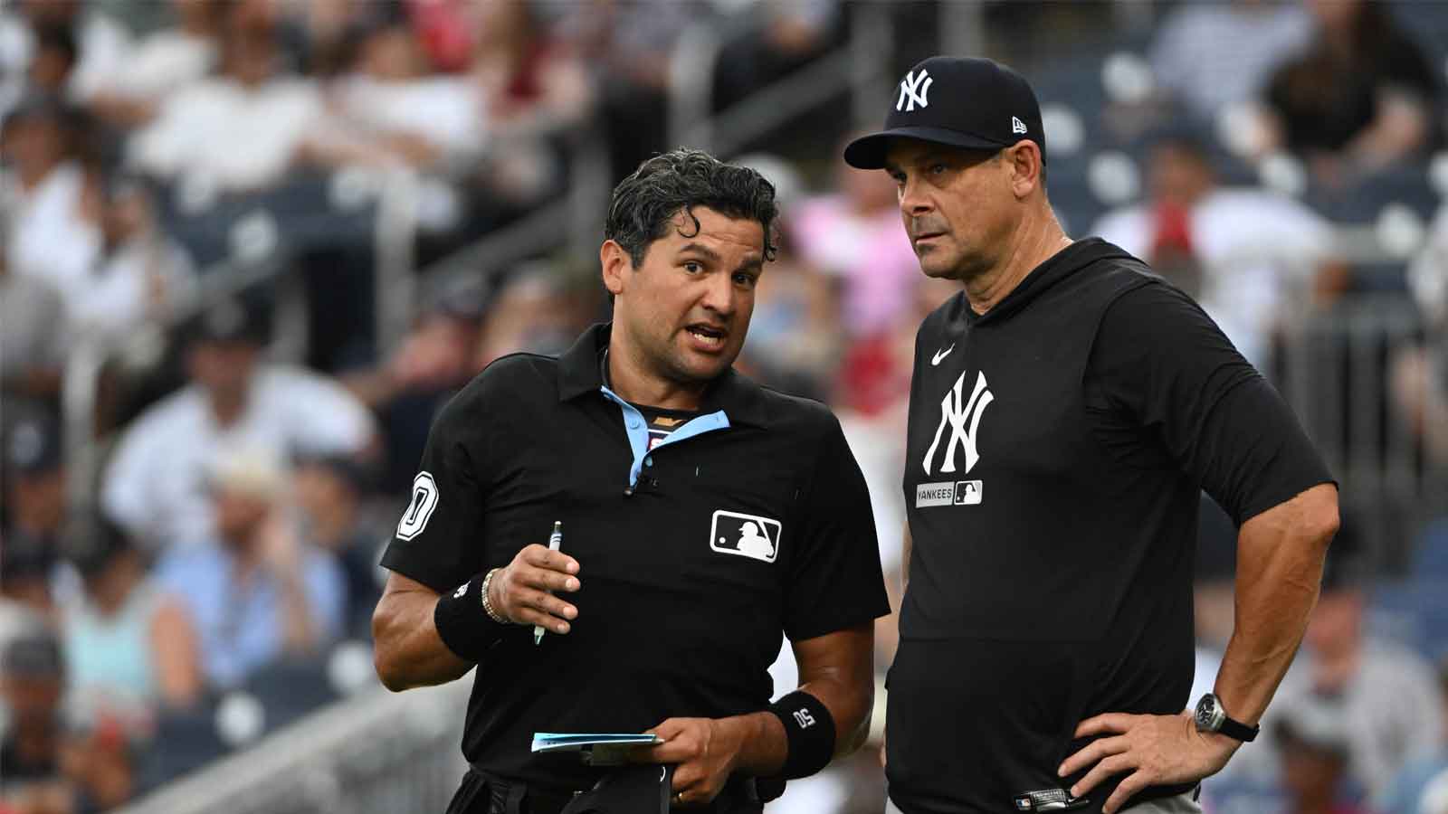 https://wp.clutchpoints.com/wp-content/uploads/2026/07/Aaron-Boone-17-talks-with-umpire-Charlie-Ramos-50.jpg