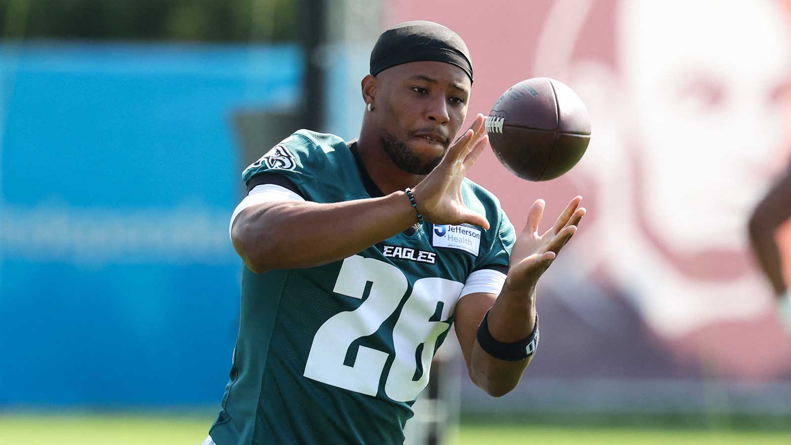 Philadelphia Eagles running back Saquon Barkley (26) catches a ball during training camp at Jefferson Health Training Complex.