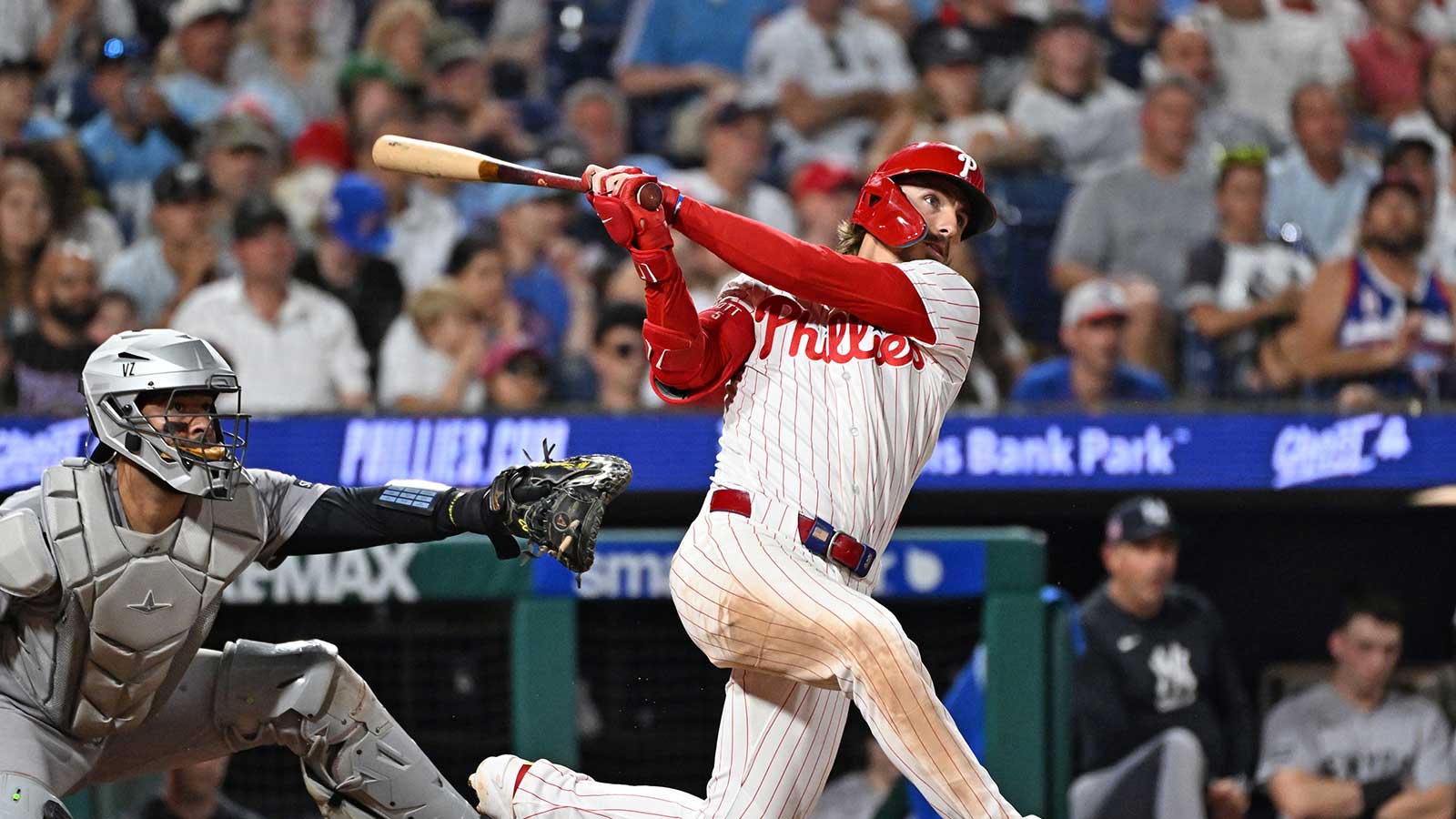 Philadelphia Phillies second baseman Bryson Stott (5) hits a three RBI double during the sixth inning against the New York Yankees at Citizens Bank Park.