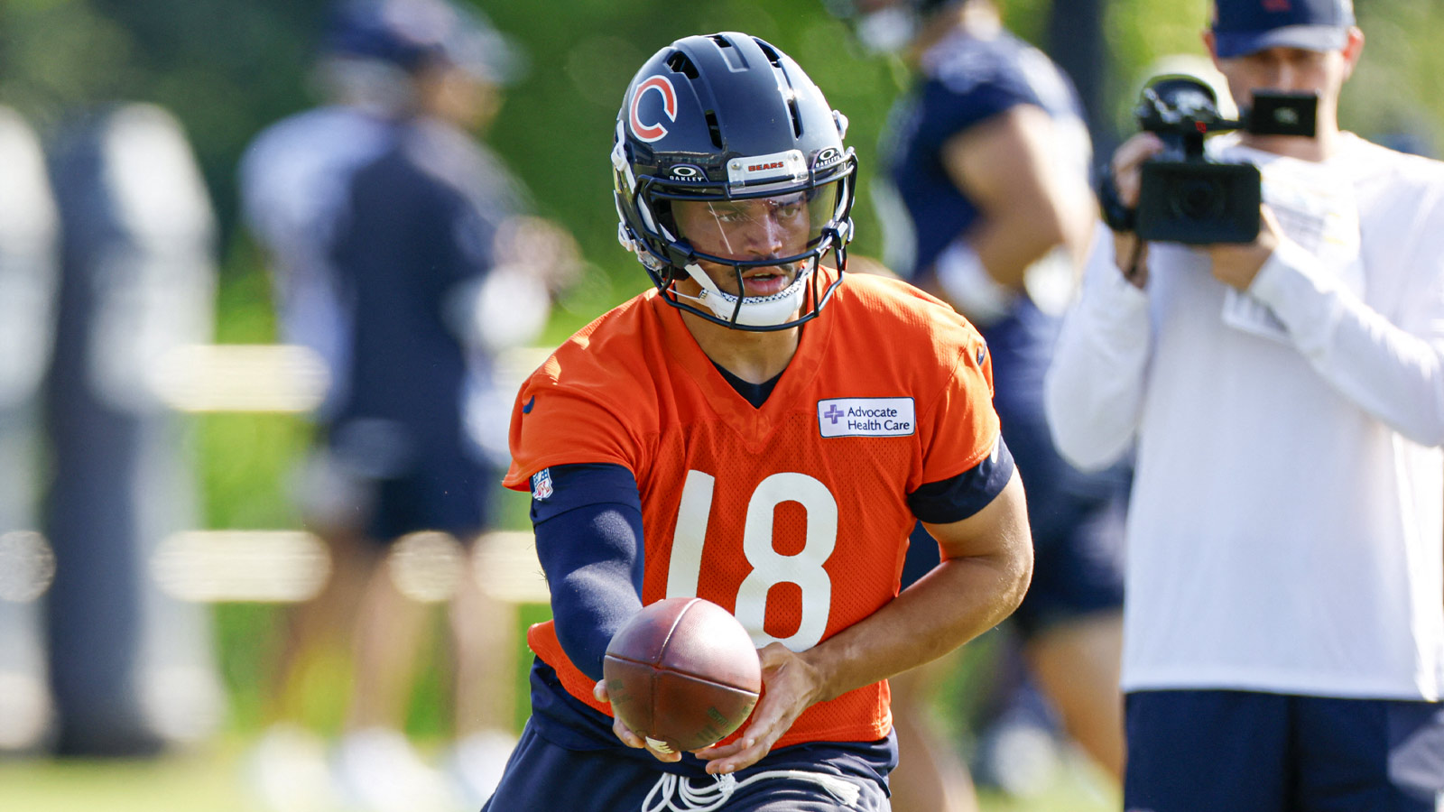 https://wp.clutchpoints.com/wp-content/uploads/2026/07/Caleb-Williams-looks-to-pass-the-ball-during-Training-Camp.jpg