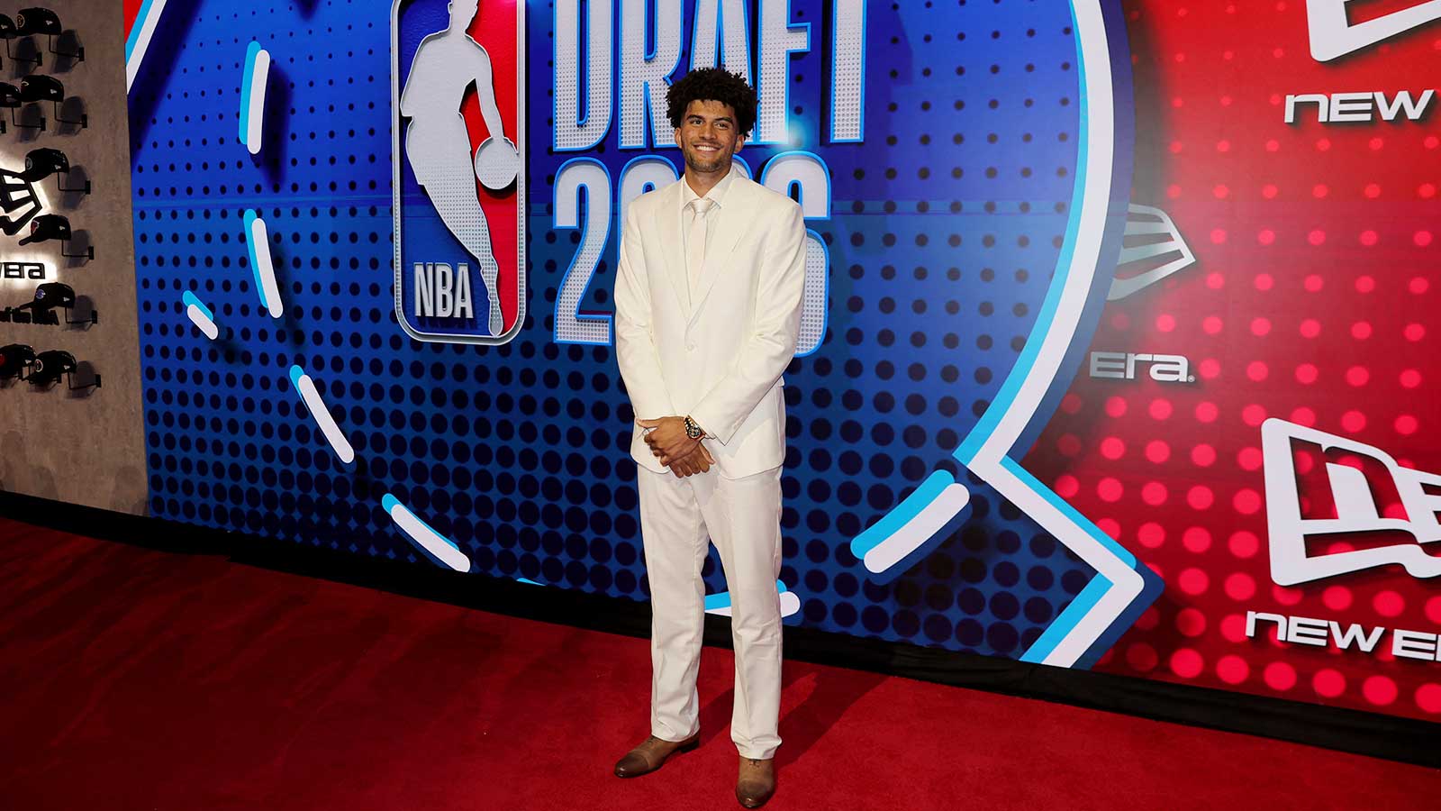 https://wp.clutchpoints.com/wp-content/uploads/2026/07/Cameron-Boozer-arrives-at-the-NBA-Draft-before-getting-selected-by-Grizzlies.jpg