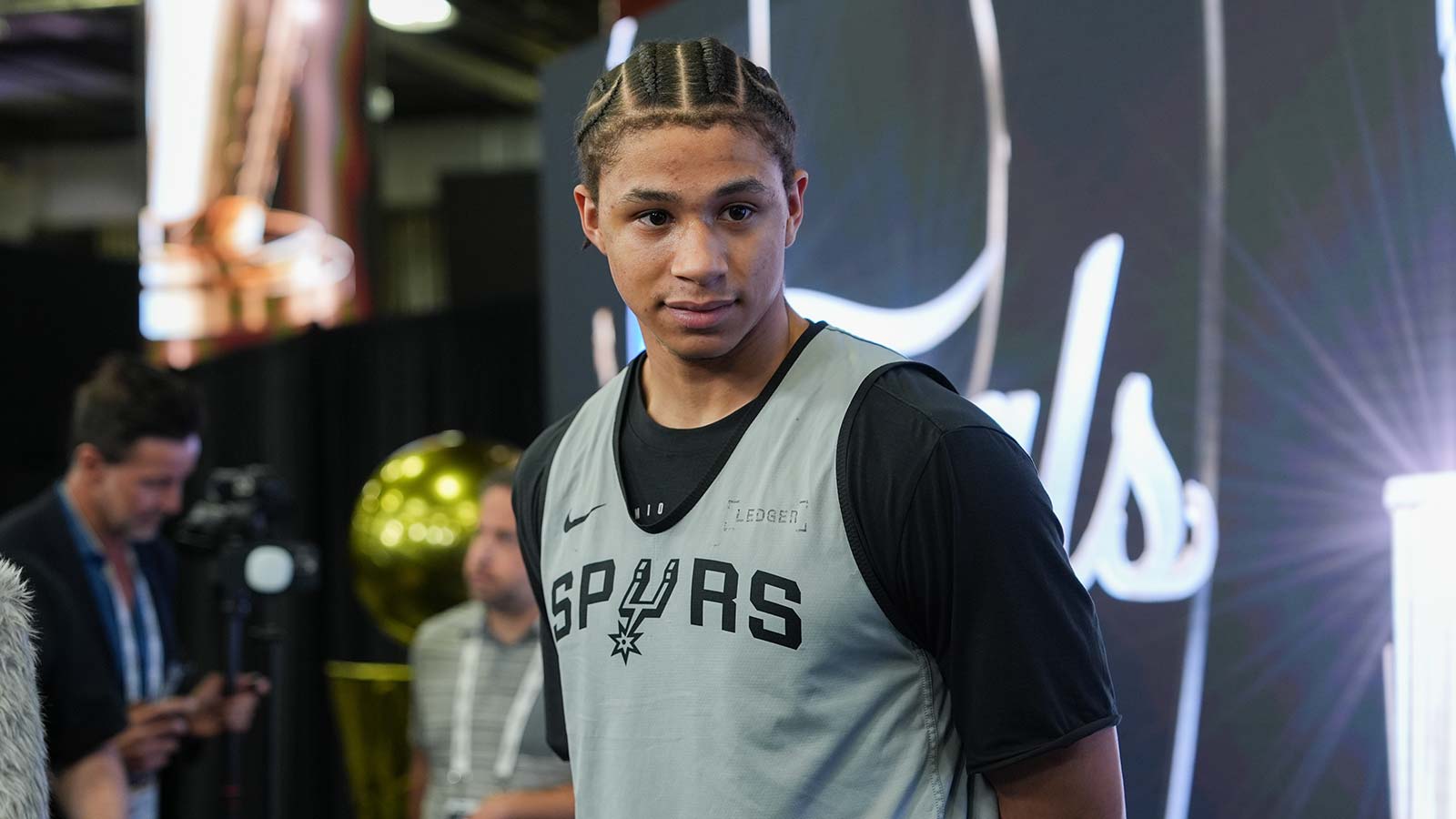 https://wp.clutchpoints.com/wp-content/uploads/2026/07/Carter-Bryant-talks-to-the-press-during-media-day-for-the-2026-NBA-Finals.jpg