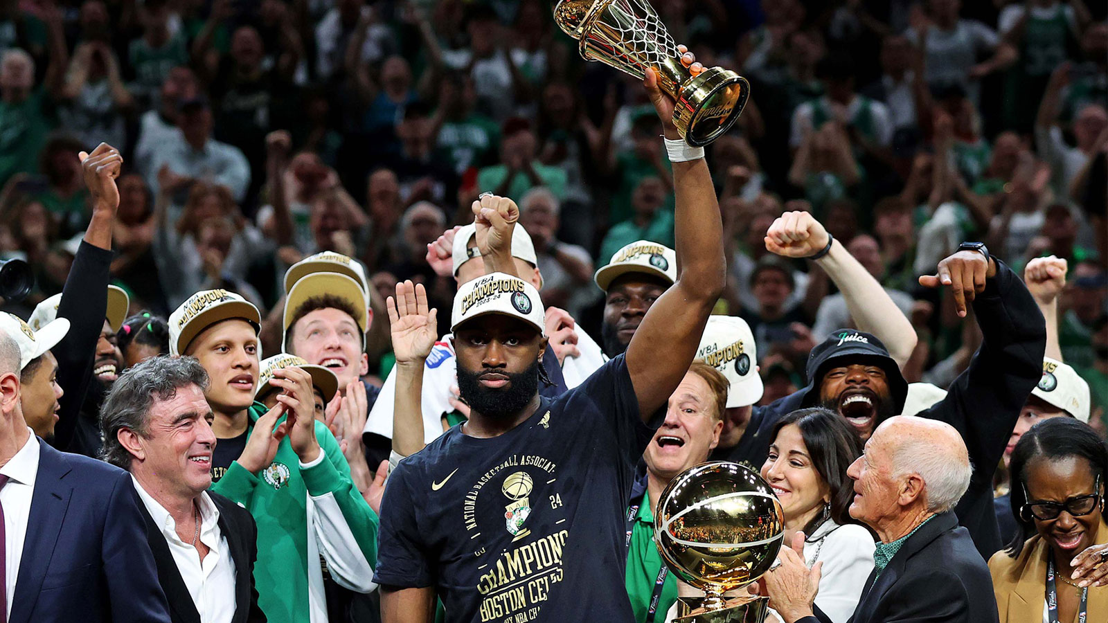 Celtics guard Jaylen Brown (7) celebrates after winning the NBA Finals MVP after game five of the 2024 NBA Finals against the Dallas Mavericks at TD Garden