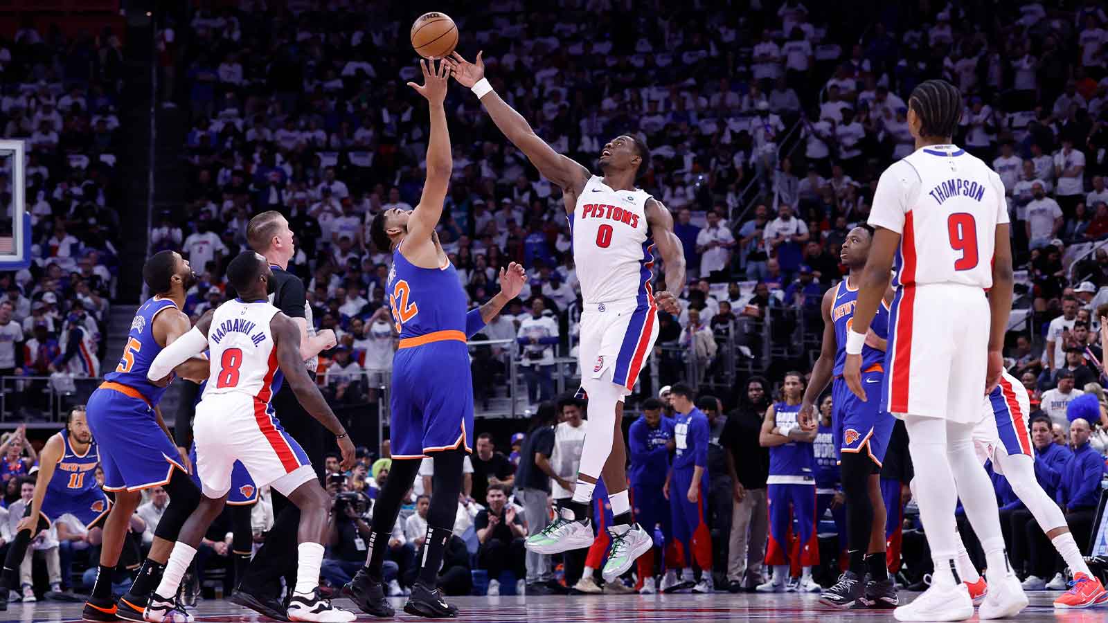 New York Knicks center Karl-Anthony Towns (32) and Detroit Pistons center Jalen Duren (0) tip off in the first half during game six of first round for the 2024 NBA Playoffs at Little Caesars Arena.