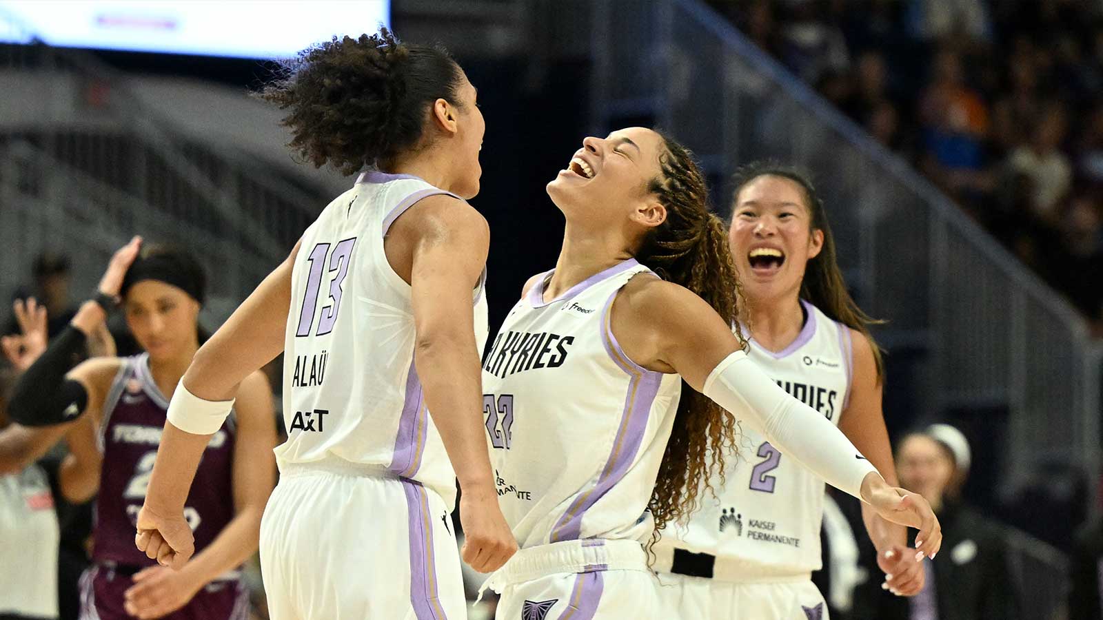 Golden State Valkyries forward Janelle Salaun (13) celebrates with guards Veronica Burton (22) and Kaitlyn Chen (2) after making a basket against the Toronto Tempo in the second half at Coca-Cola Coliseum.