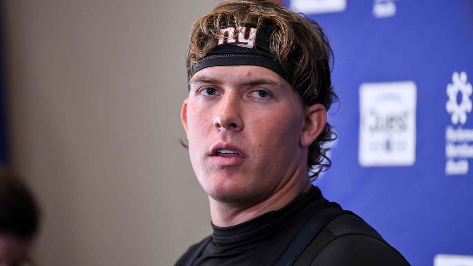 New York Giants quarterback Jaxson Dart (6) speaks at a press conference during organized team activities at Quest Diagnostics Training Center.