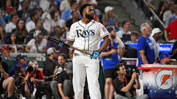 Tampa Bay Rays third baseman Junior Caminero (13) makes a play at bat during the home run derby at Citizens Bank Park