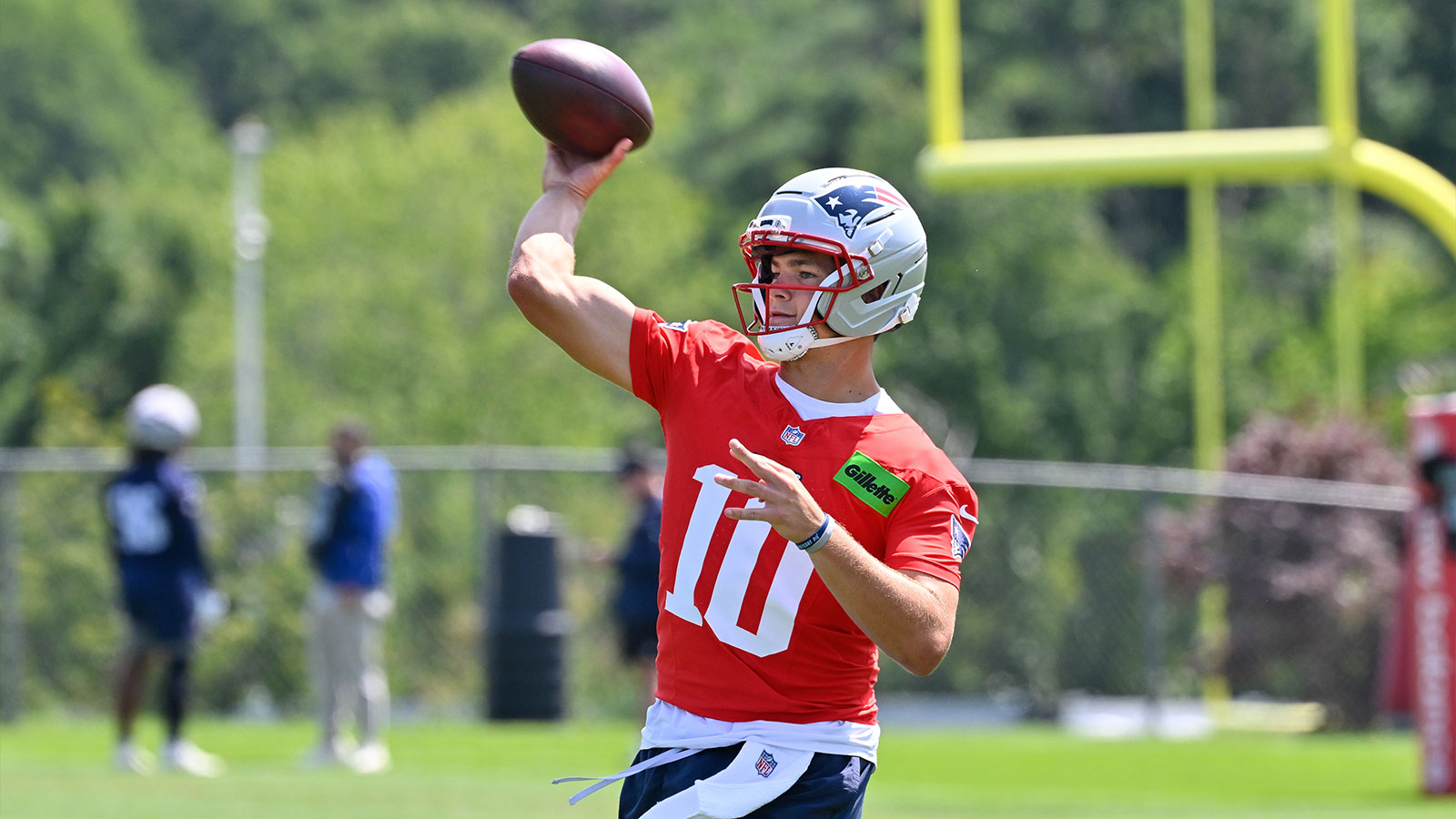 New England Patriots quarterback Drake Maye (10) throws a pass at training camp at Gillette Stadium.