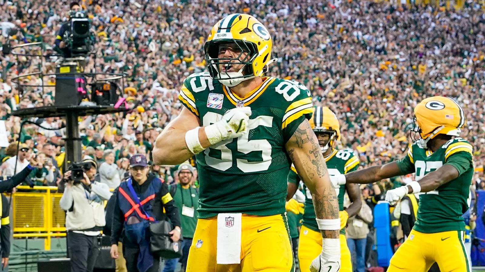 Green Bay Packers tight end Tucker Kraft (85) celebrates a touchdown in the fourth quarter against the Cincinnati Bengals at Lambeau Field.
